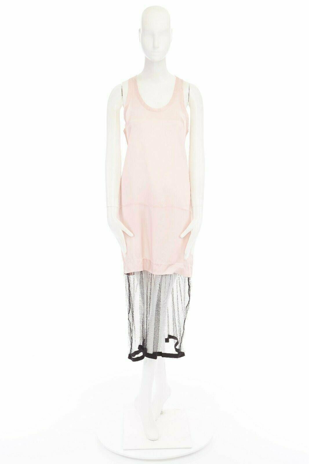 TOGA PULLA baby pink cupra body attached black nylon mesh hem midi dress JP1 S 
Reference: WEYN/A00188 
Brand: Toga Archives 
Material: Cupra 
Color: Pink 
Pattern: Other 
Extra Detail: Cupra, nylon. Baby pink cupra body. Scoop neckline. Sleeveless.