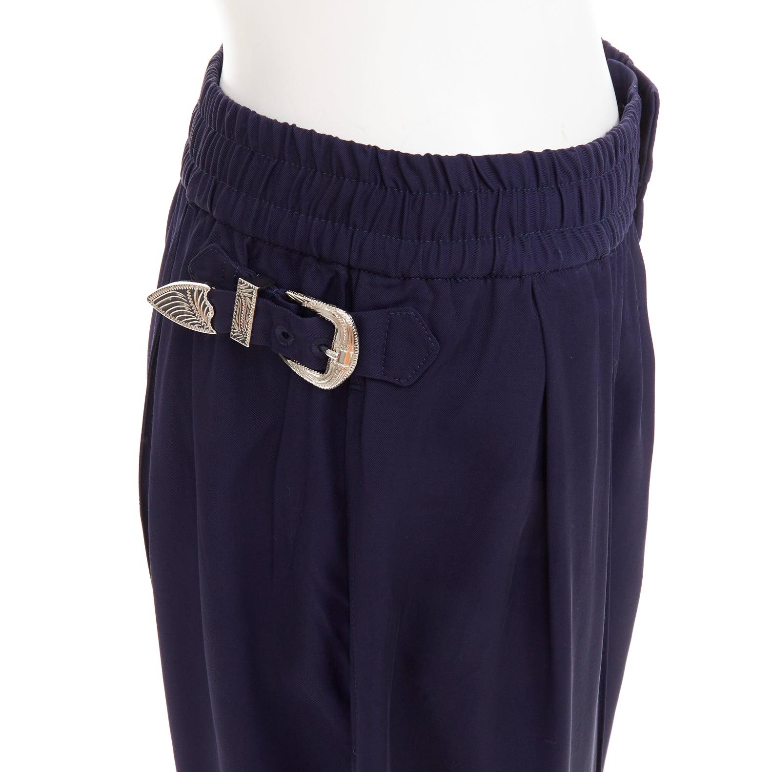 TOGA PULLA navy rayon western decorative buckles rolled hem wide pants IT38 XS
Reference: ECLO/A00205
Brand: Toga Archives
Material: Rayon
Color: Navy, Silver
Pattern: Solid
Closure: Zip Fly
Extra Details: Rolled hems.
Made in: