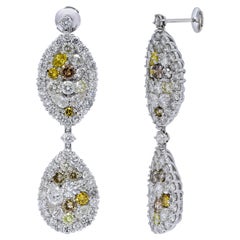 Boucles d'oreilles en or blanc 18 carats serties d'un ensemble de 14,77 carats de diamants et d'une bague