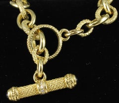 Toggle Bracelet with Diamonds and Sapphires Set in 18 Karat Yellow Gold