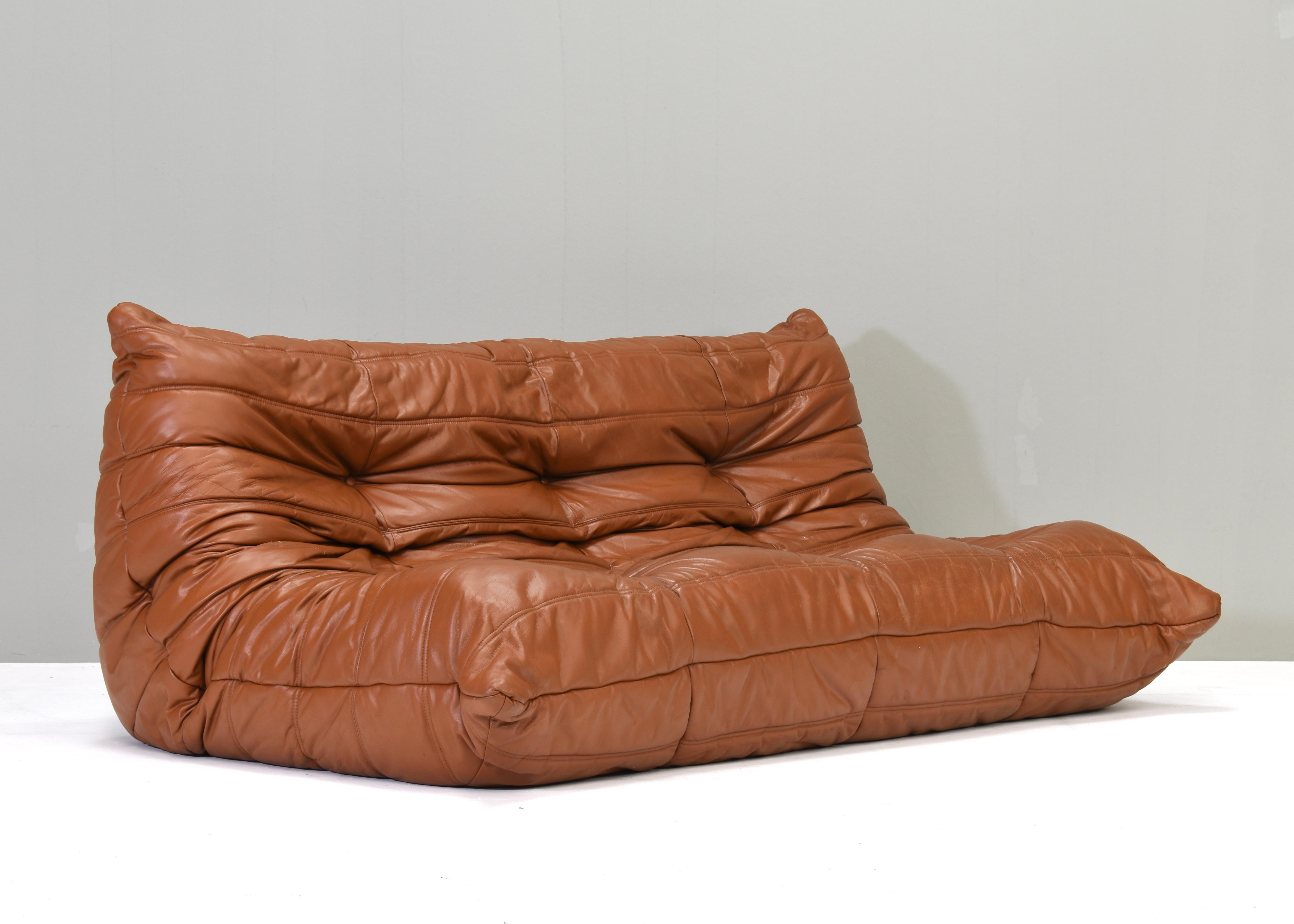 Togo sofa in tan leather by Michel Ducaroy for Ligne Roset, France – circa 1970.
The element is in good condition with some age and use related wear to the leather. See detail images. No tears or holes. The sofa has a label, the corner doesn’t