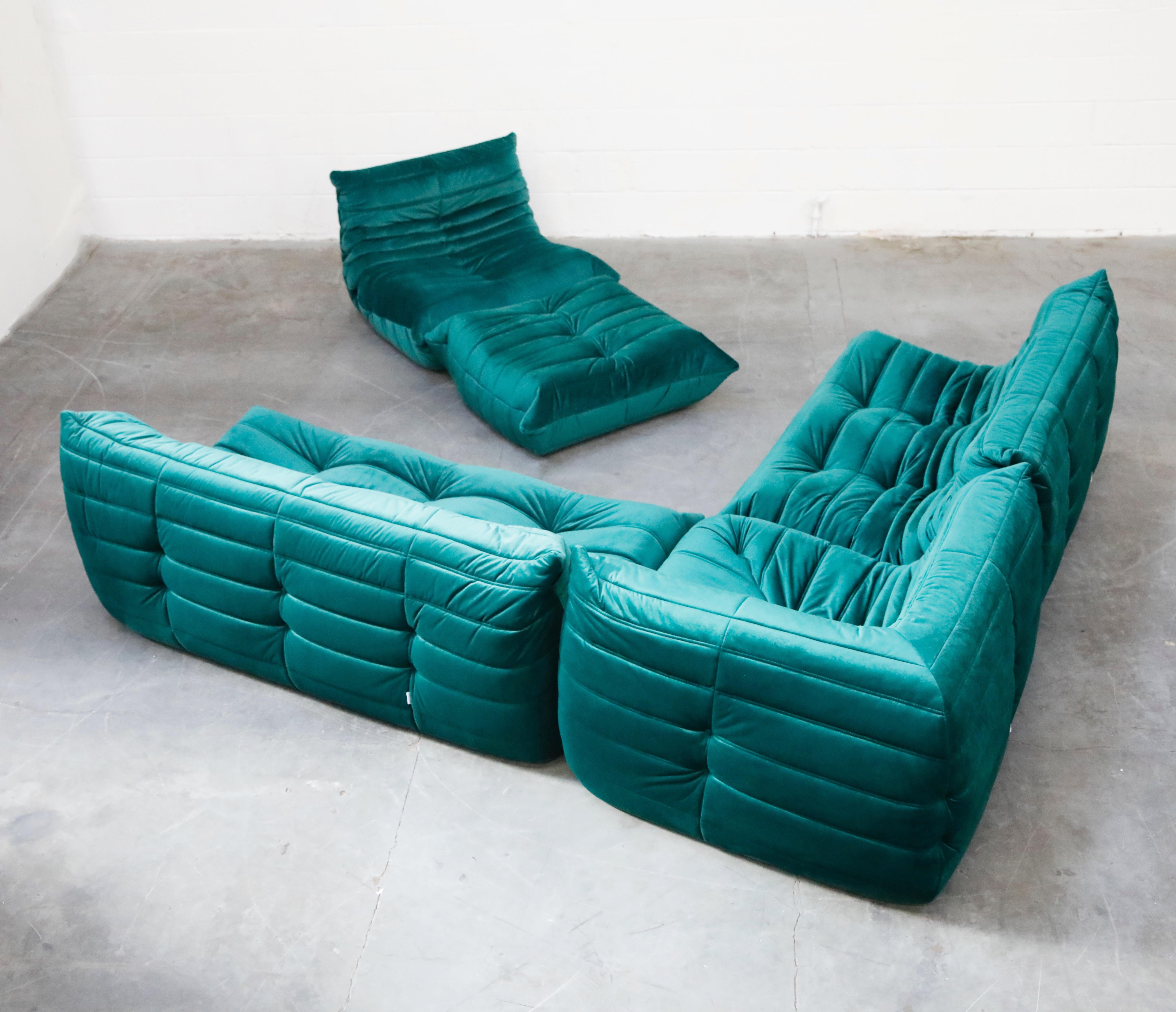 This incredible five (5) piece Togo sectional living room set, was designed by Michel Ducaroy in 1973 for Ligne Roset, France. This set was completely restored with new high grade velvet upholstery in a mesmerizing emerald green color, and bottom