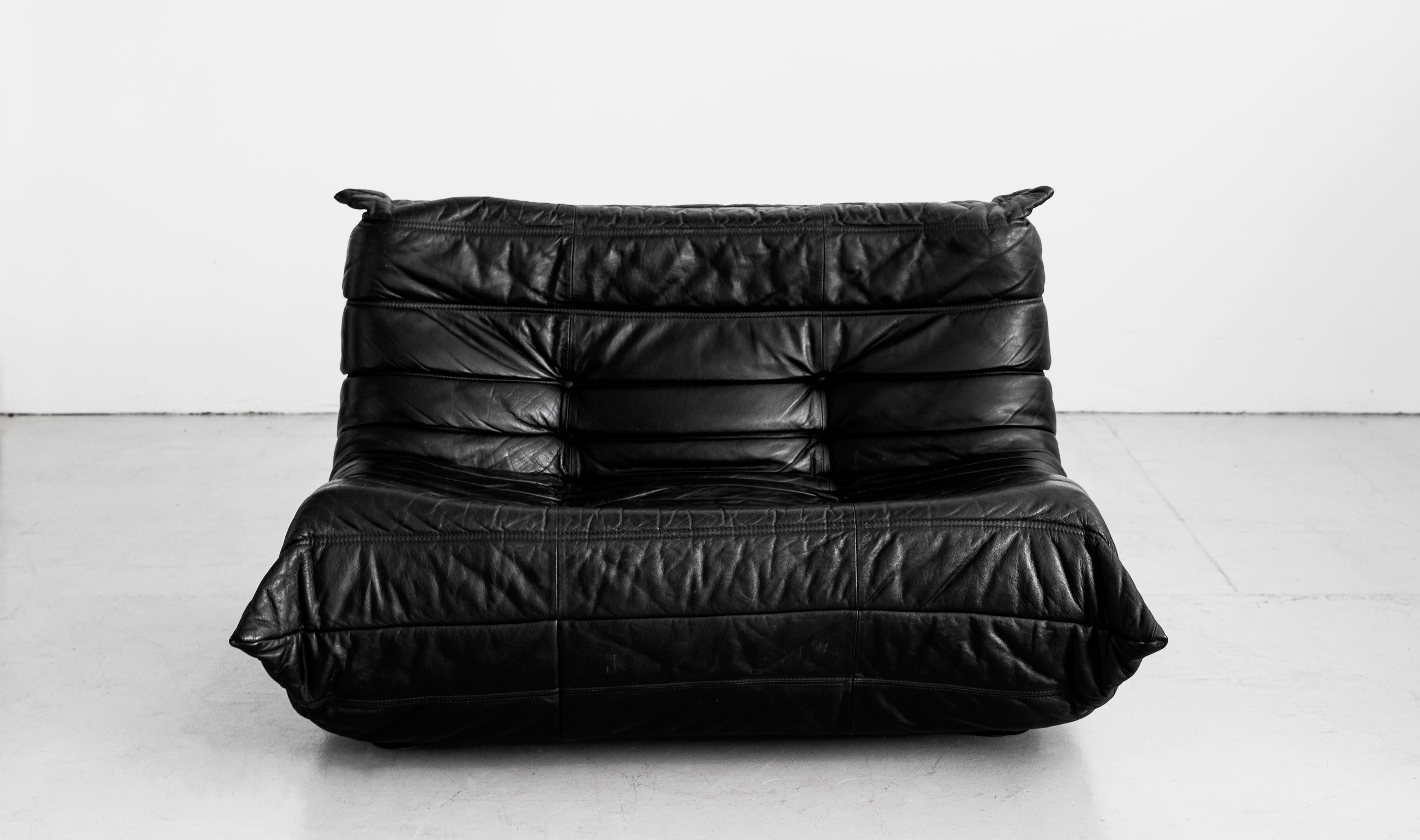 Amazing black leather loveseat from the 