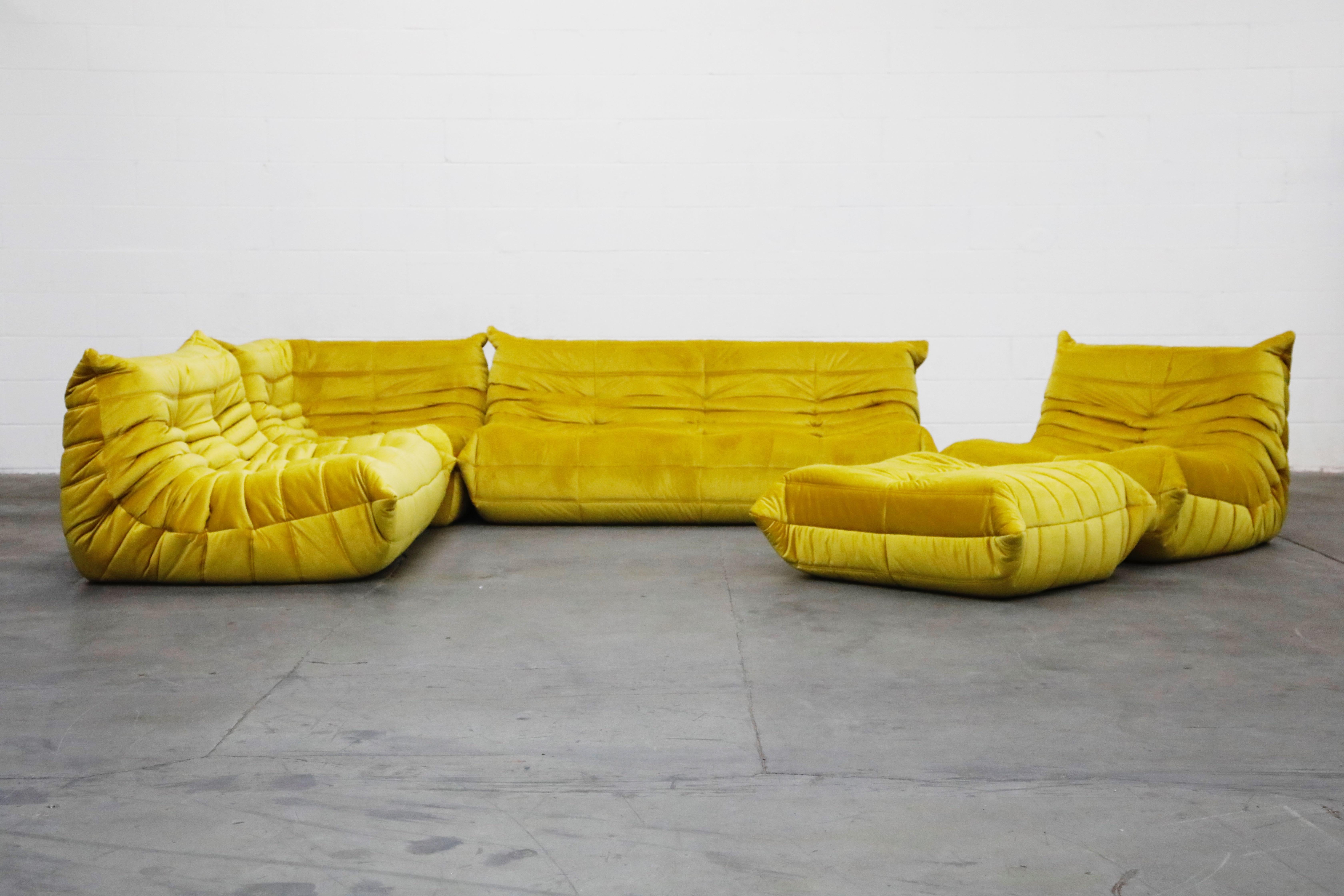 This incredible five (5) piece Togo sectional living room set, was designed by Michel Ducaroy in 1973 for Ligne Roset, France. This set was completely restored with new high grade velvet upholstery in a mesmerizing golden chartreuse color, and