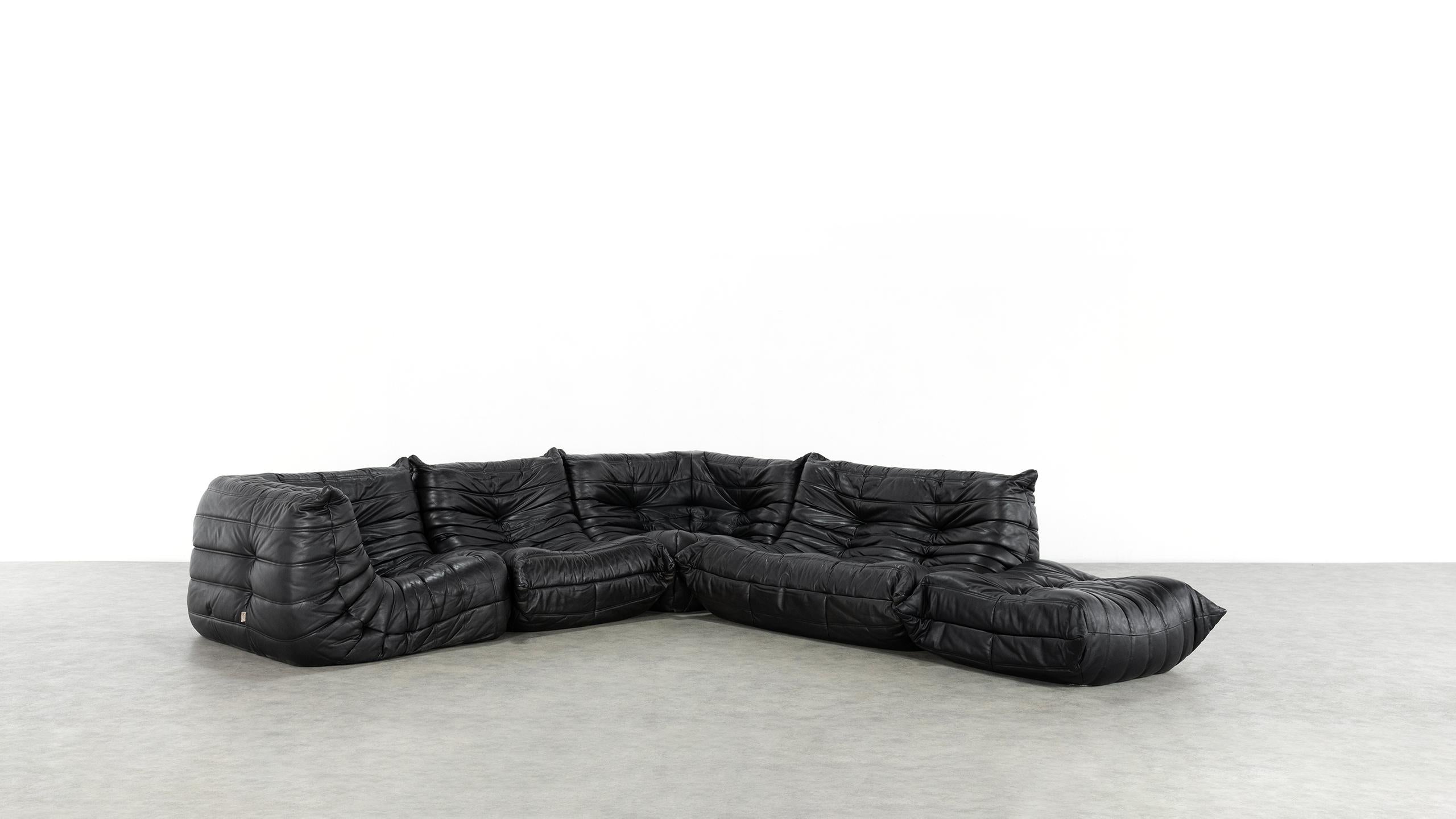 This Togo living landscape sofa was designed by Michel Ducaroy in 1974.

Made by Ligne Roset about 1990 in France, stunning beautiful original condition in soft black leather.
Completely original, not an 