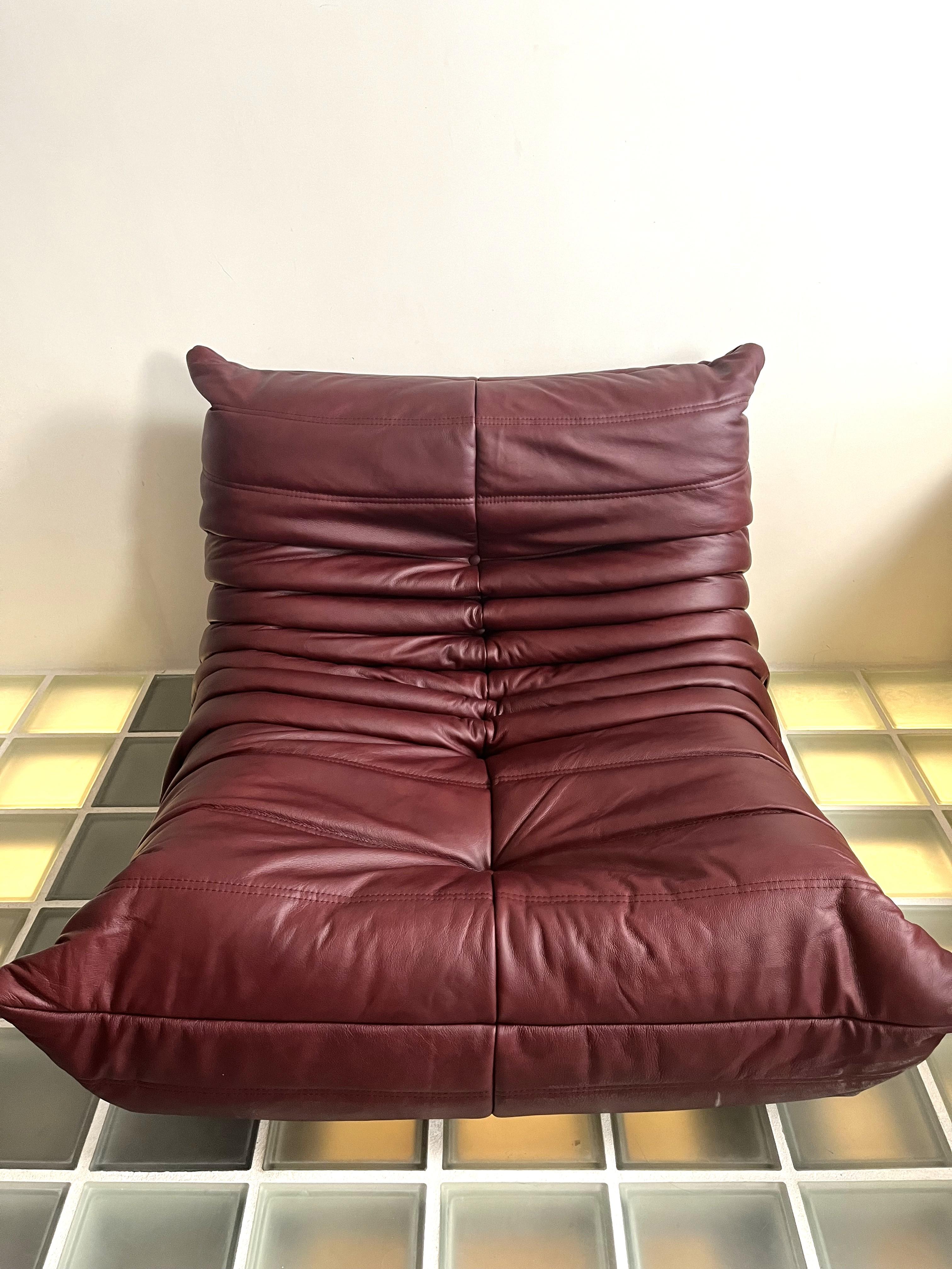 Togo Sofa, by Michel Ducaroy for Ligne Roset, 
Togo sofa in velvet by Michel Ducaroy for Ligne Roset
The designer was inspired by the tooth paste tube
Thi set is made of: 1 seater, 2 seater and corner
upholsted with bordoux leather