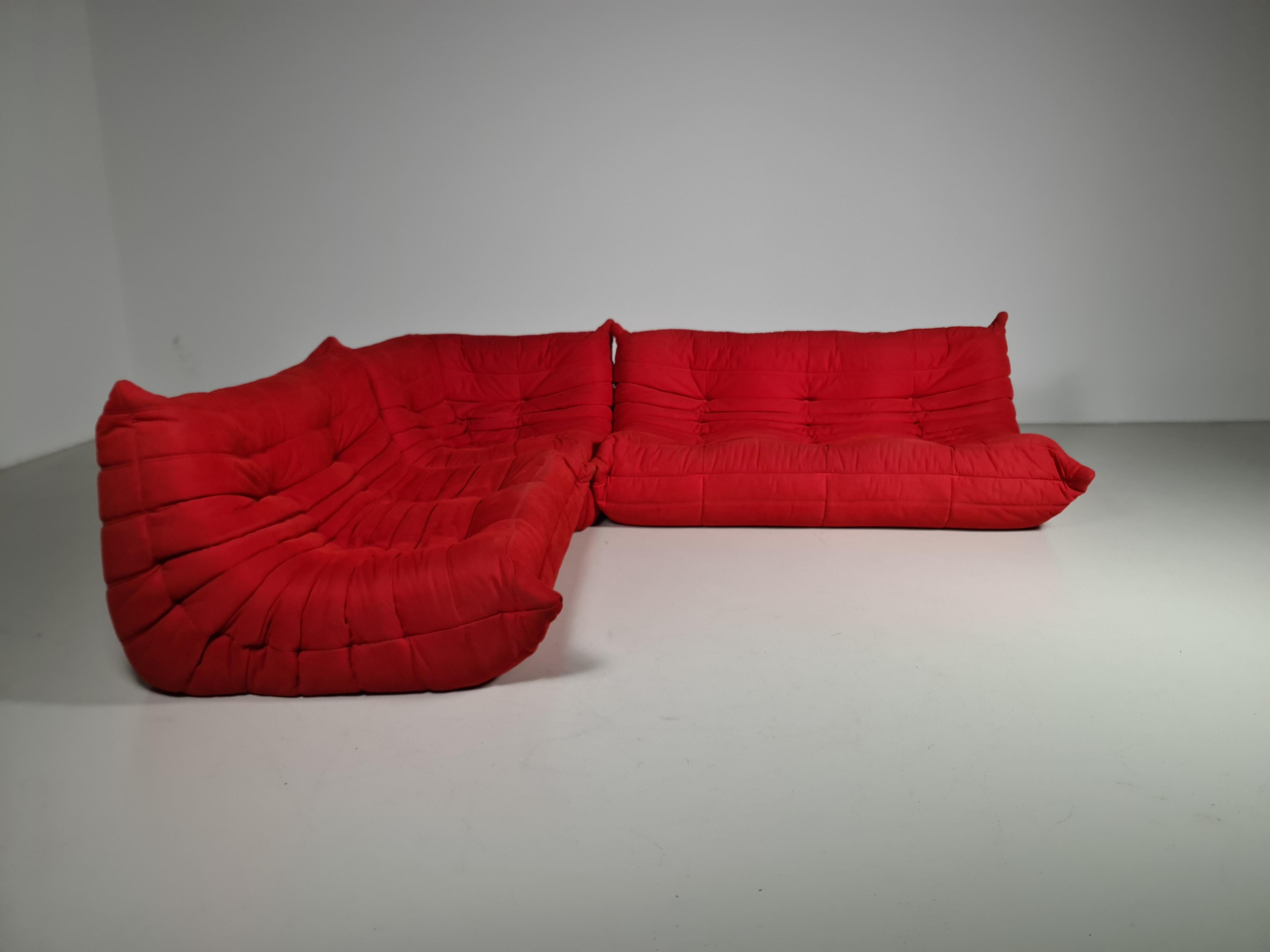 Togo sofa, by Michel Ducaroy for Ligne Roset.

This three-piece modular set is incredibly versatile and can be configured into one large corner sofa or split for a multitude of seating arrangements.
It still has the original fabric.
All of the