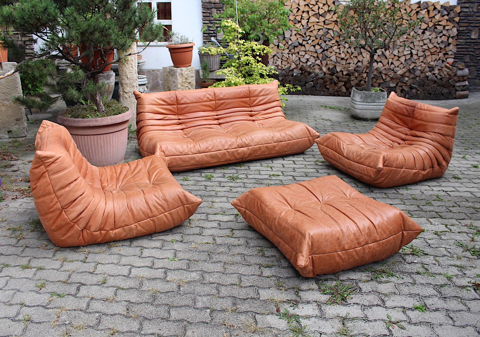 Togo vintage cognac brown four sectional sofa pieces leather settee designed Michel Ducaroy for Ligne Roset 1973.
Fantastic design from the 1970s with iconic character and cosy pleats and wrinkles, perfect to style your own ideas from a