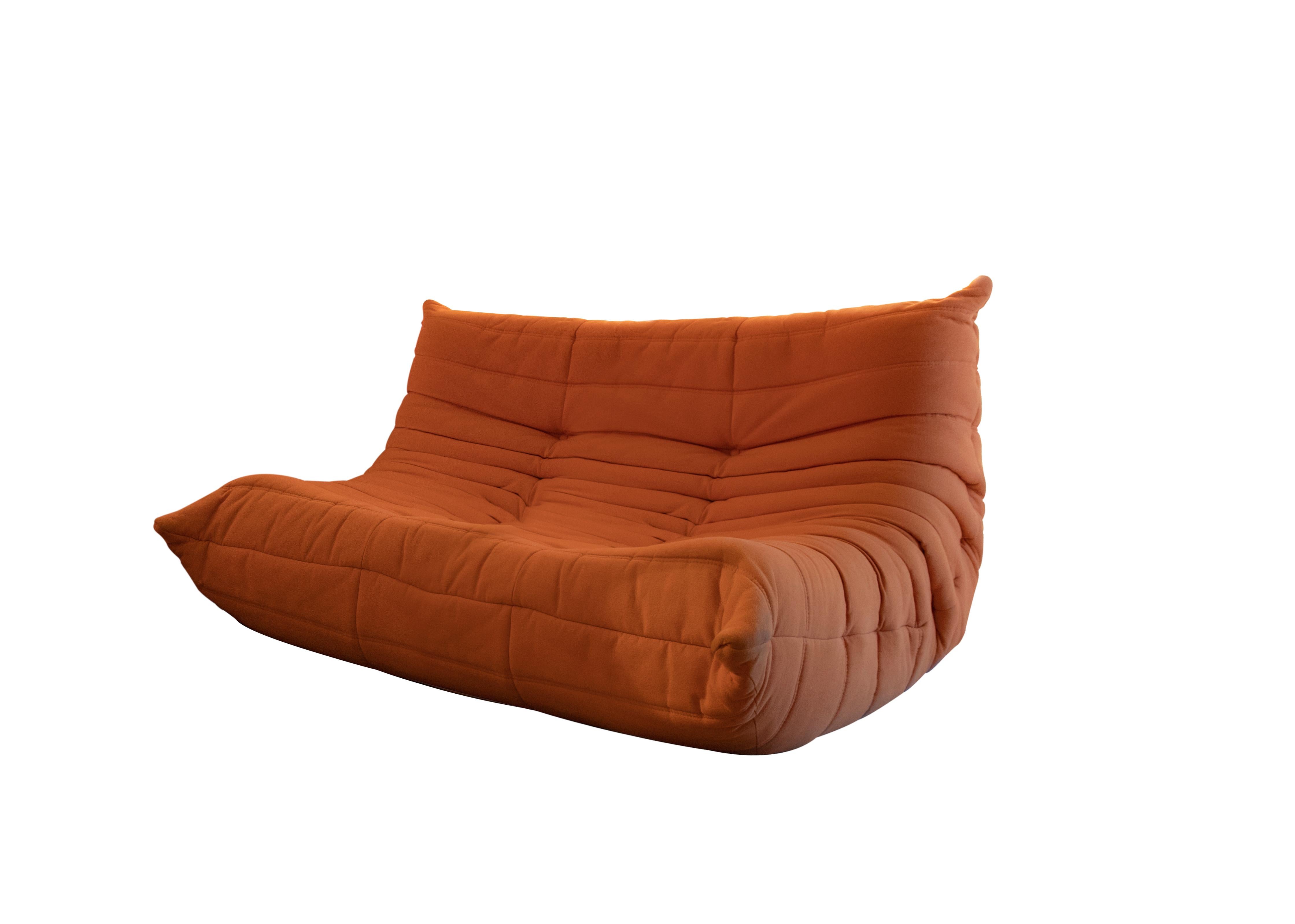 Togo sofa is a midcentury design sofa set designed by Michel Ducaroy for Ligne Roset, in the 1970s

The set consist in four orange colored all-foam cushion seating.

Very good conditions.

Very rare iconic sofa of great success and popularity,