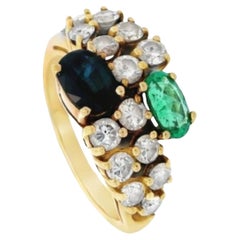 Toi et Moi Ring aus 18 Karat Gold mit Diamanten, Smaragd und Saphir