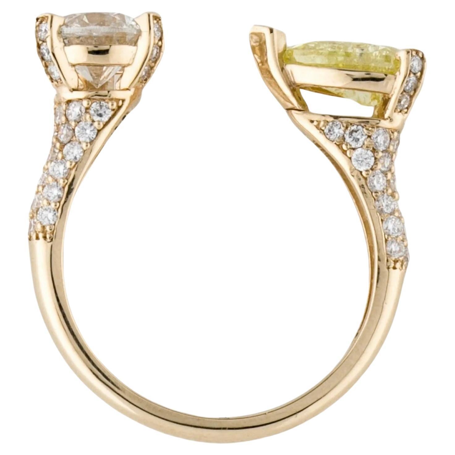 A Truly breathtaking 2.52ctw Diamond *Toi et Moi* Bypass Ring. 
One-of-a-kind beauty.

Featuring a Fancy Intense Yellow pear-shaped diamond and H color round-shaped diamond, accented by 66 round brilliant cut diamonds. Both center stones are