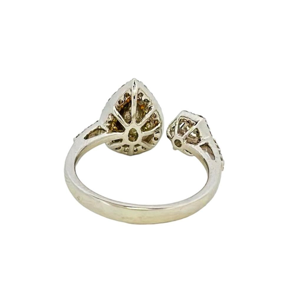 Modern Toi et Moi Ring with a Fancy Yellow Pear Shaped and a Hexagonal Step Cut Diamond
