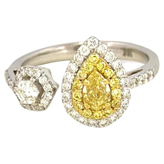 Toi et Moi Ring with a Fancy Yellow Pear Shaped and a Hexagonal Step Cut Diamond For Sale