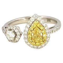 Used Toi et Moi Ring with a Fancy Yellow Pear Shaped and a Hexagonal Step Cut Diamond