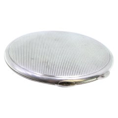 Toiletry box in guilloche silver with opening application and mirror inside