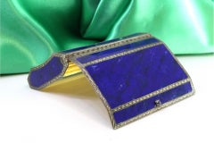 Toiletry box in silver coated with blue lapis lazuli and with a gold interior