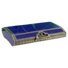 Toiletry box in silver coated with blue lapis lazuli and with a gold interior