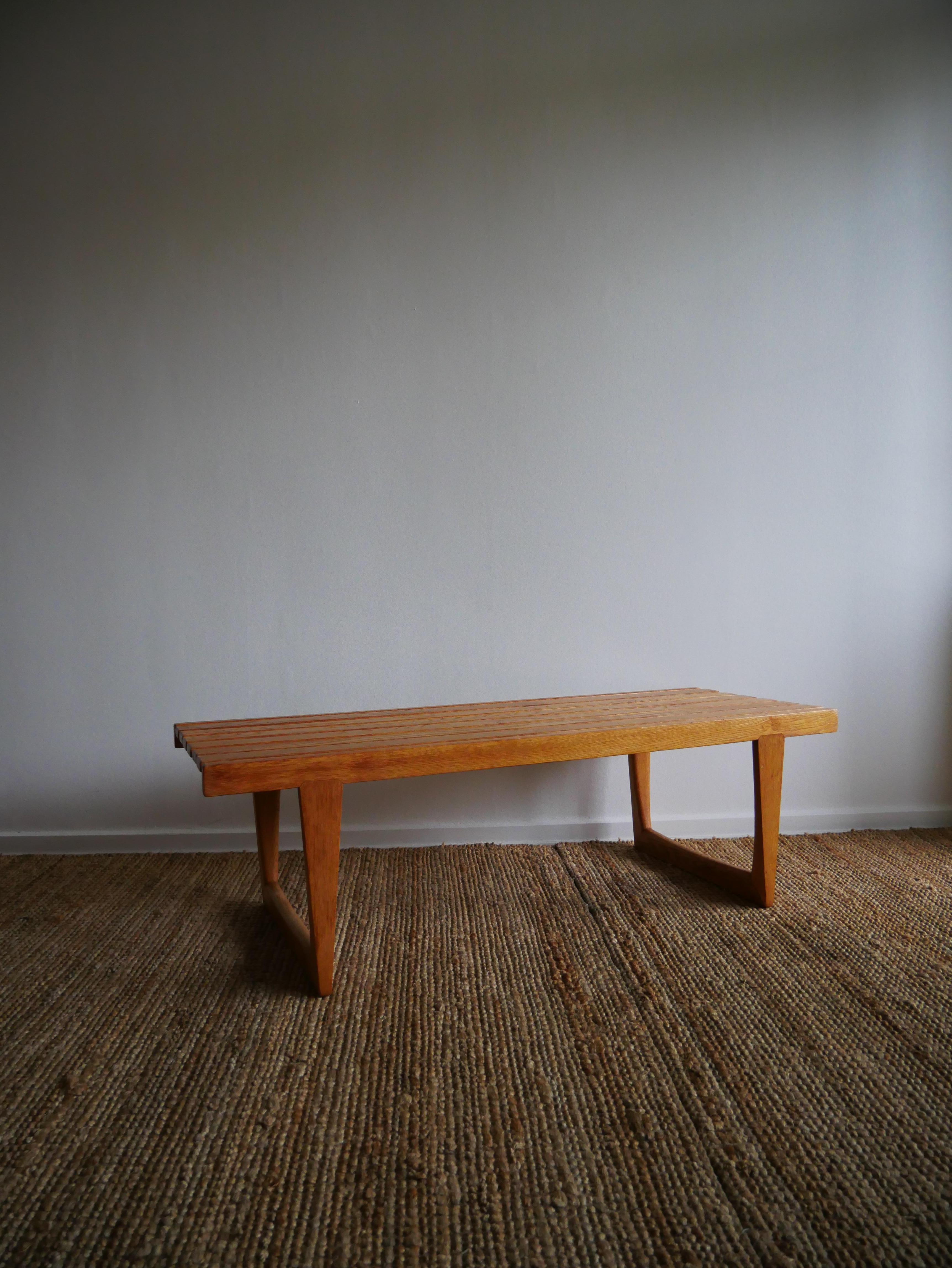 The iconic Tokyo bench

Made by Yngvar Sandström for Nordiska Kompaniet, in the Triva serie, 1960s.
In solid oak, great condition with some small traces of wear.

Tag is missing.

Height: 35 cm
Depth: 42 cm
Widht: 112 cm.