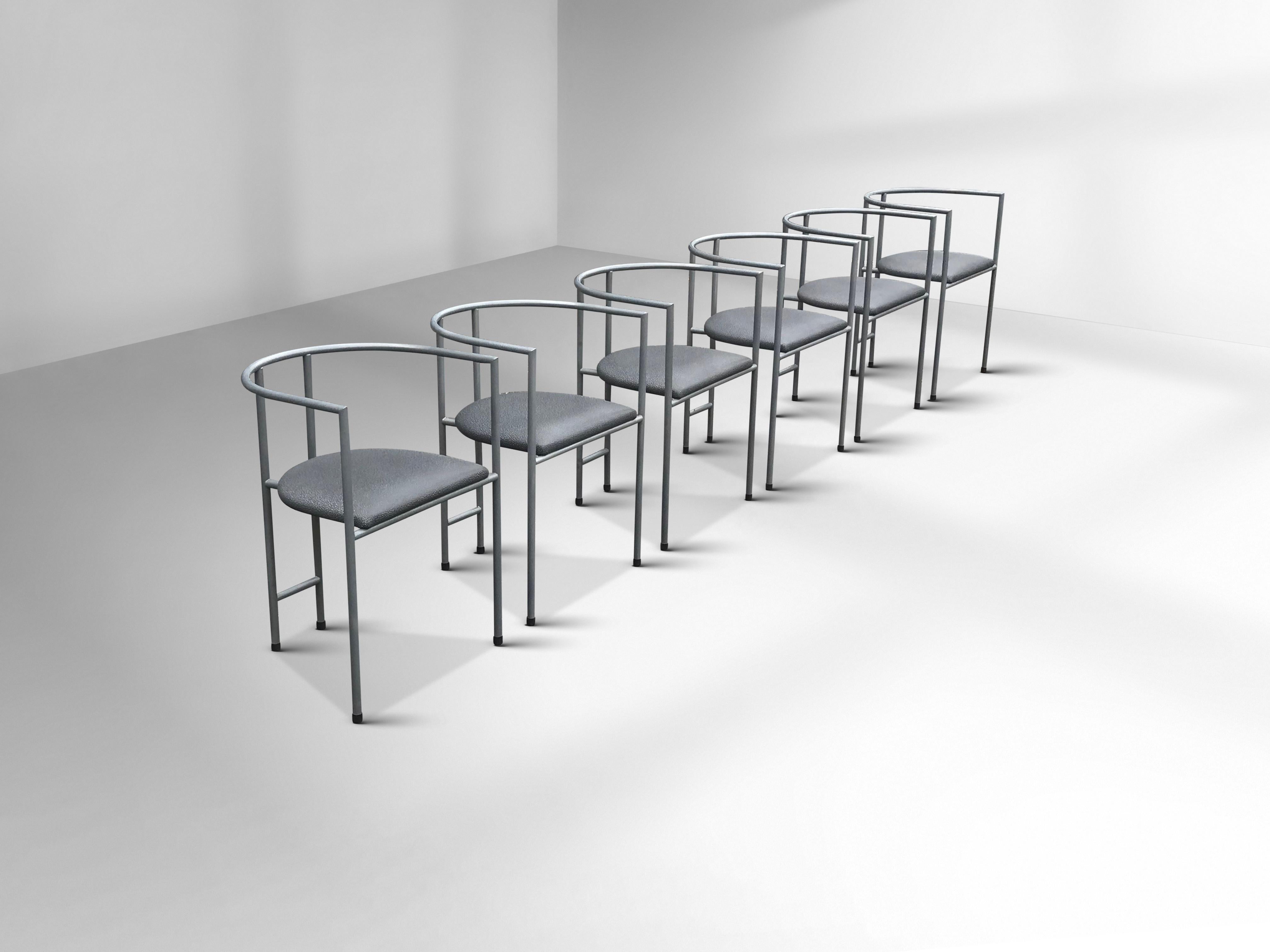 Set of Rodney Kinsman Tokyo chairs. Beauty and simplicity combined into one design. These Tokyo chairs are a rare design variant with armrests with grey frame and grey skai.

Rodney Kinsman (United Kingdom, 1943)  studied furniture design at the