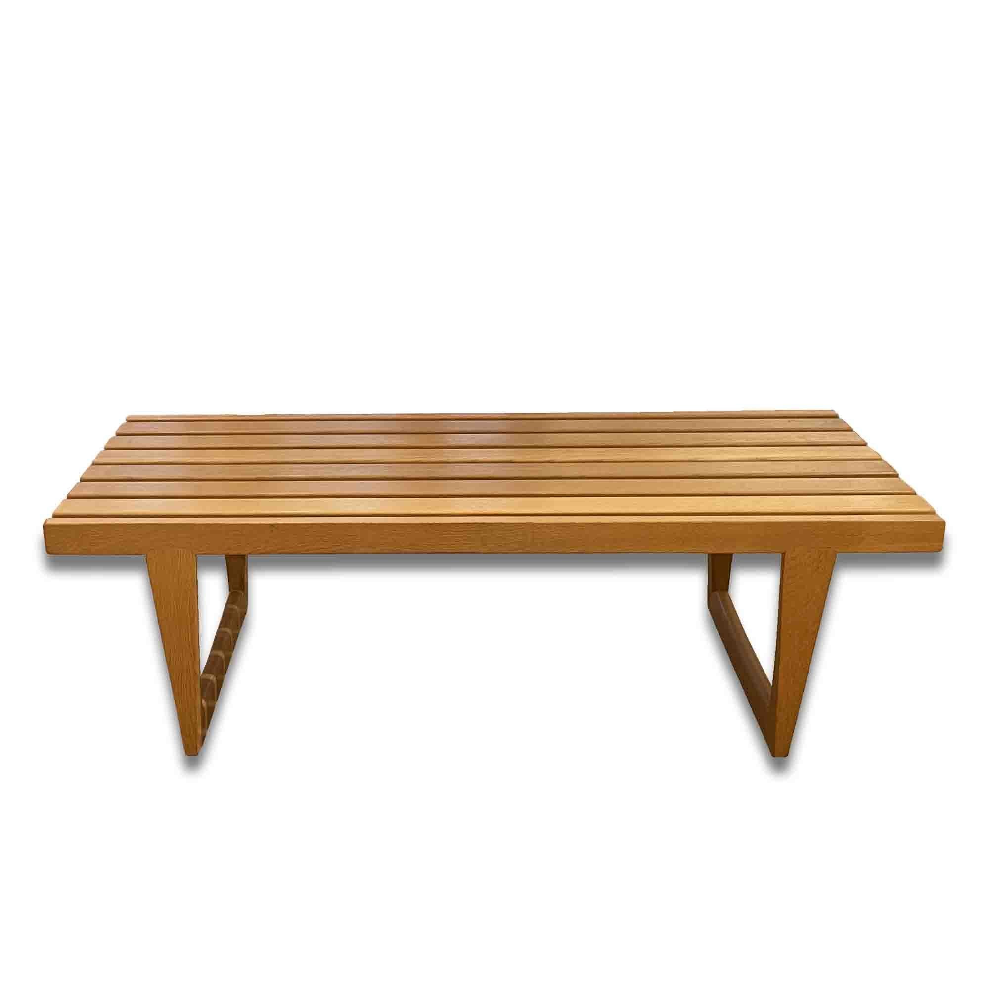 Sandstrom's work is known for its functional, minimalist aesthetic, as well as its use of sustainable, eco-friendly materials.
This bench is both a sleek design and a functional piece thanks to its classic style and natural charm of solid oak. A