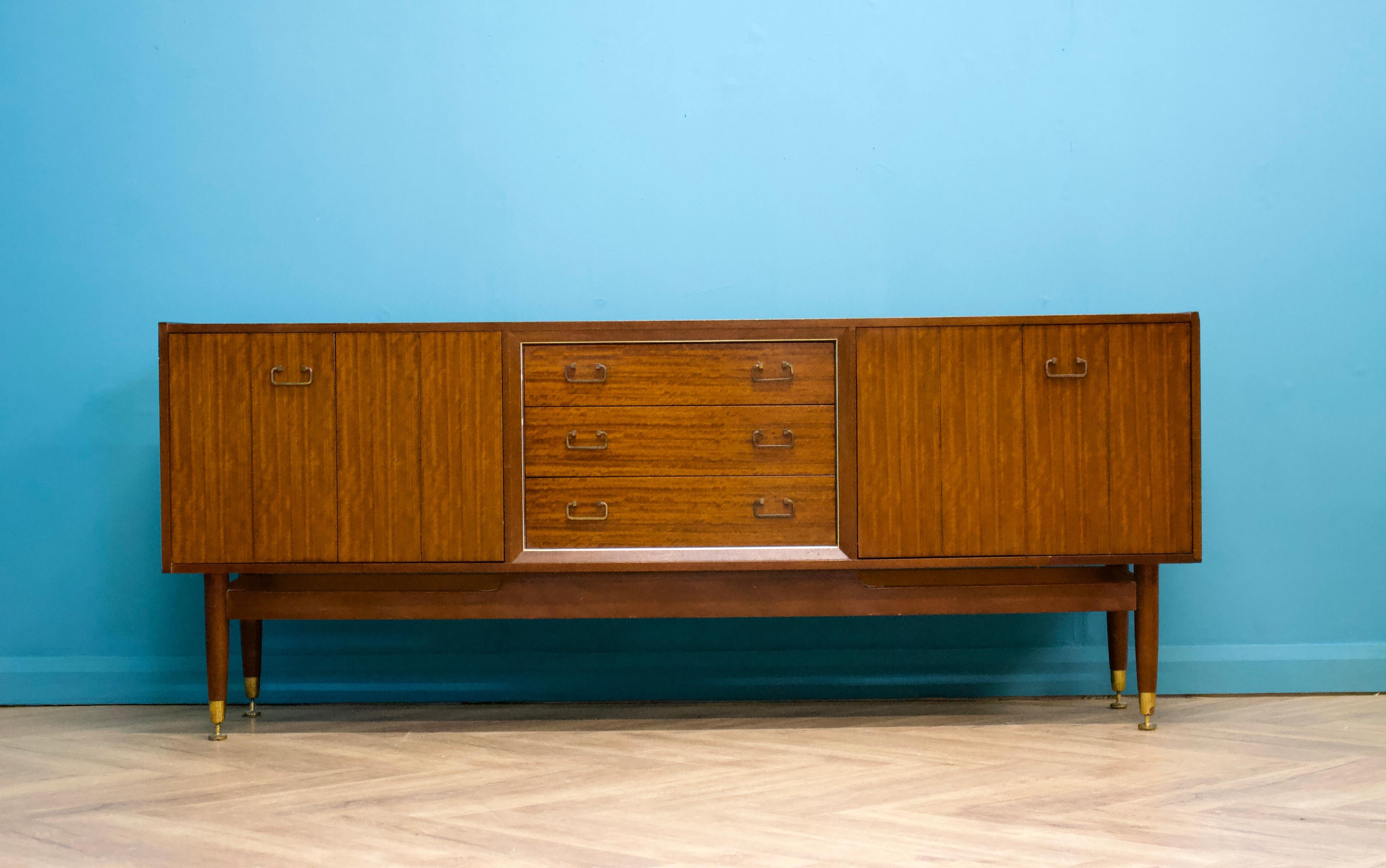 A mid century Tola sideboard from G Plan (E Gomme)
Featuring two bi fold cupboard doors and three drawers