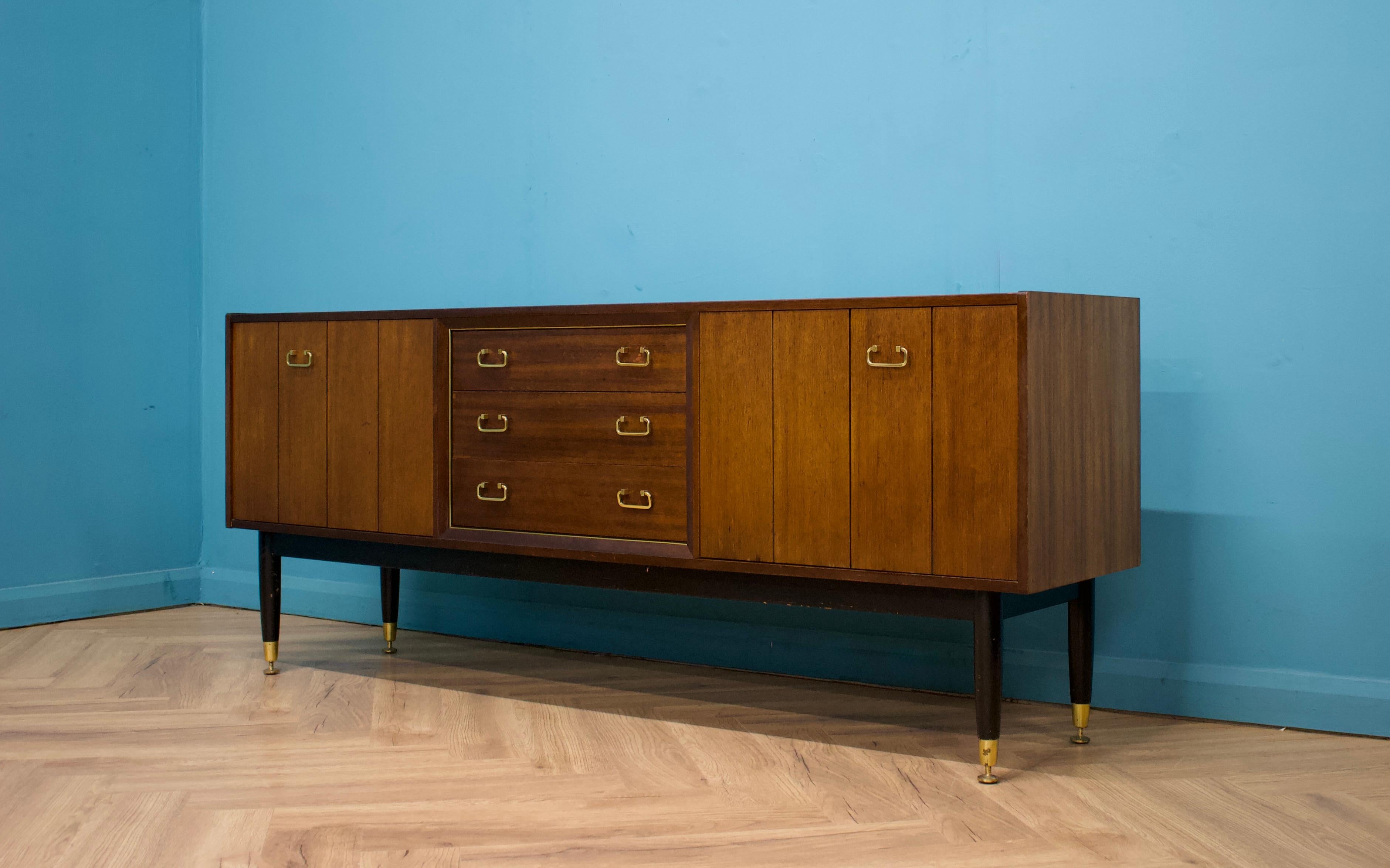 A mid century Tola sideboard from G Plan (E Gomme)
Featuring two bi fold cupboard doors and three drawers