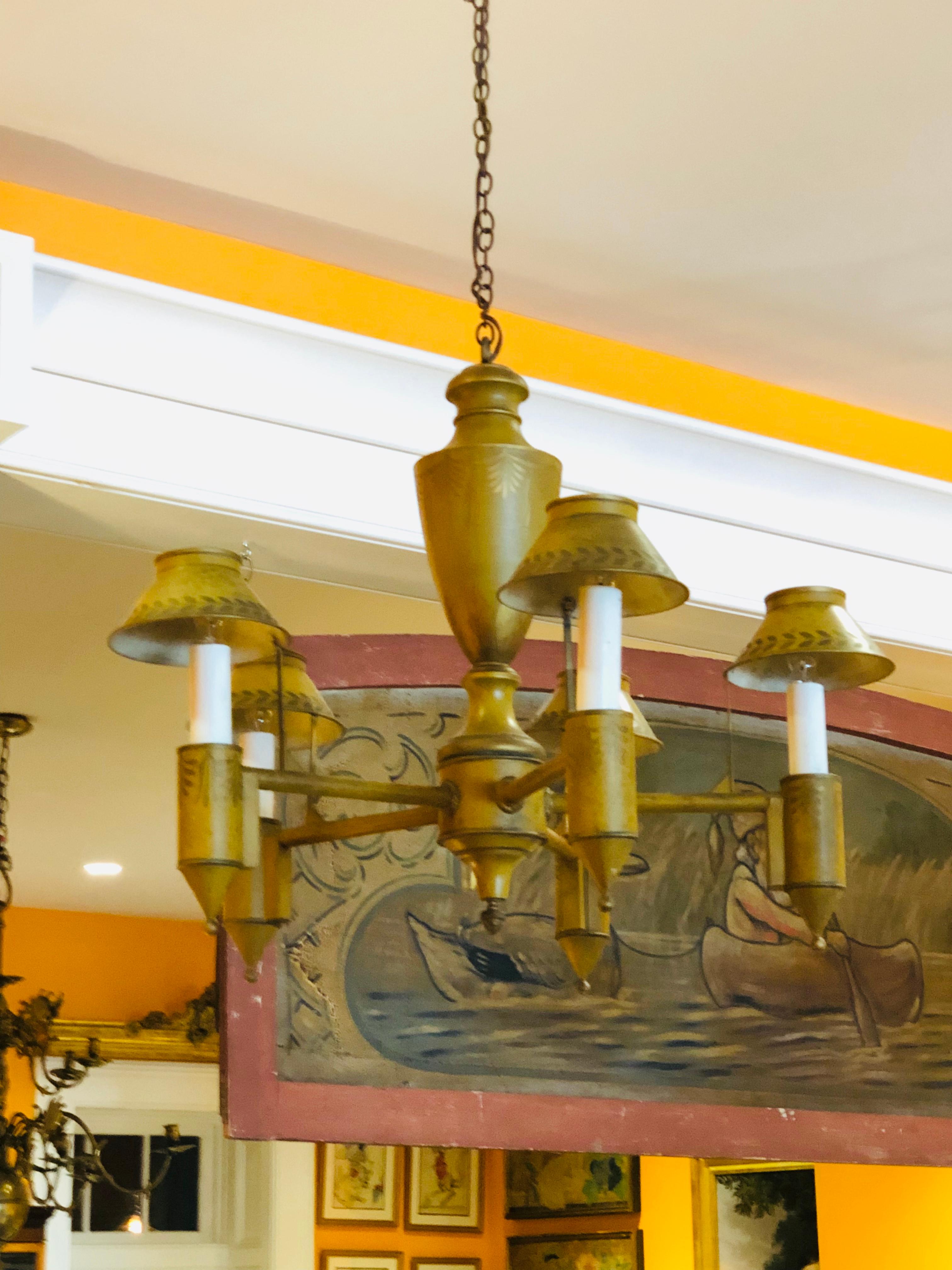 Tole chandelier with original mustard and hand stenciled paint, 20th century.