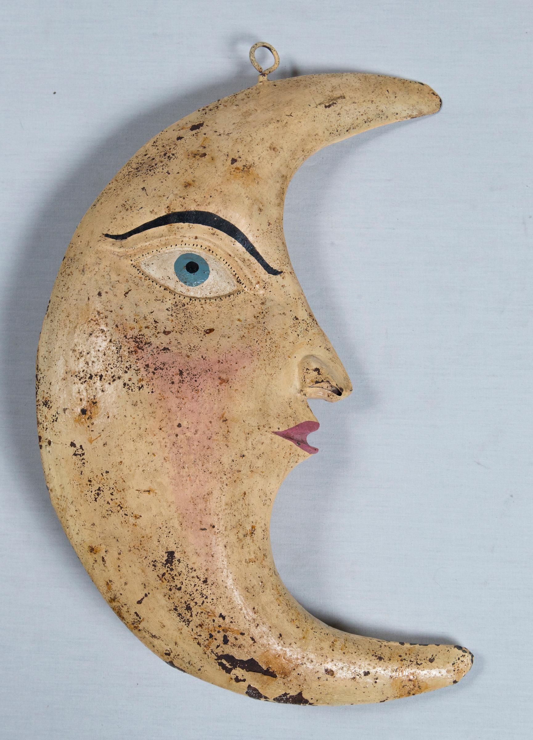 Unusual three dimensional tole crescent moon with an interesting hand painted face.