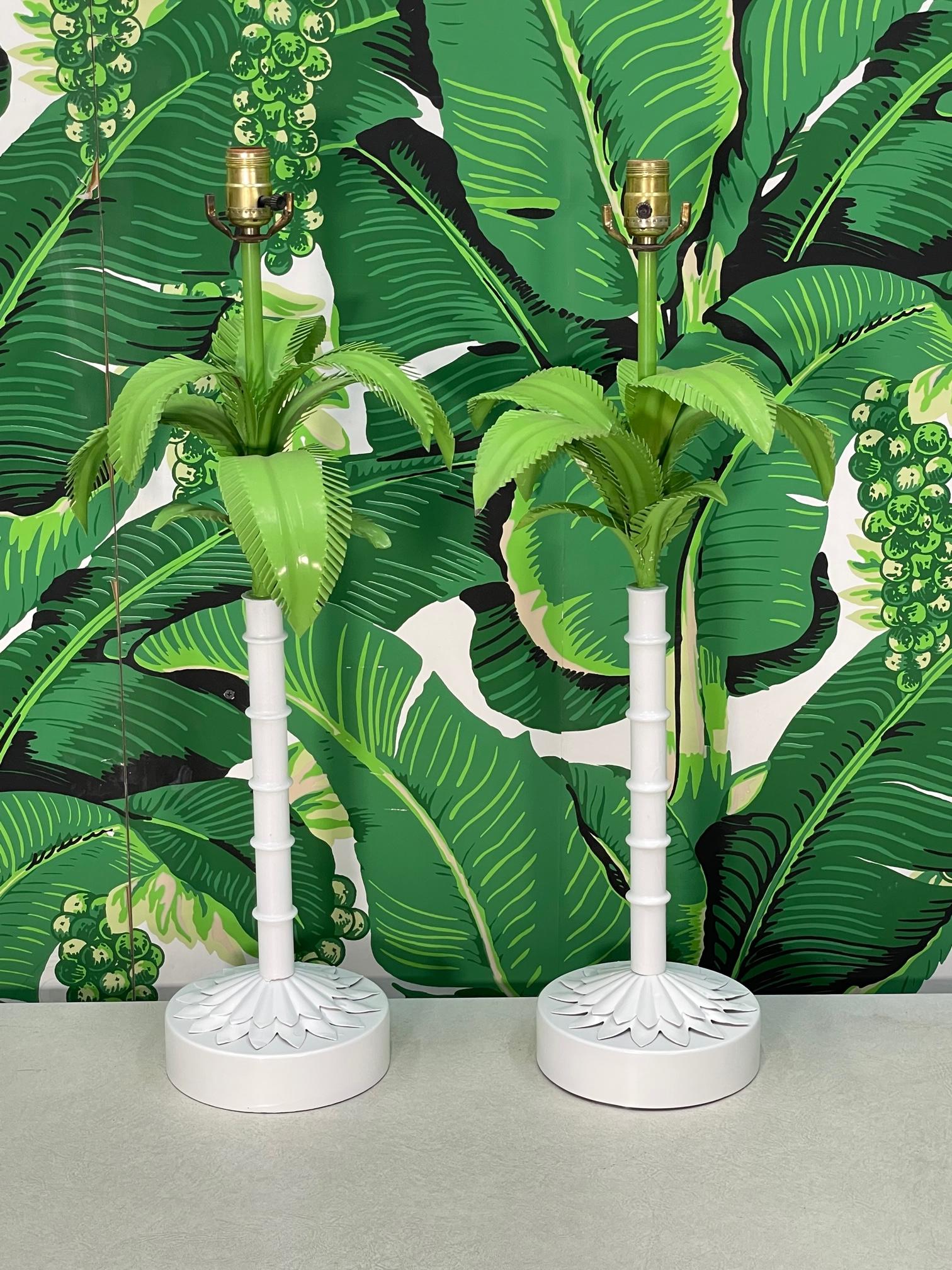 Pair of tole metal palm tree lamps feature a faux bamboo 