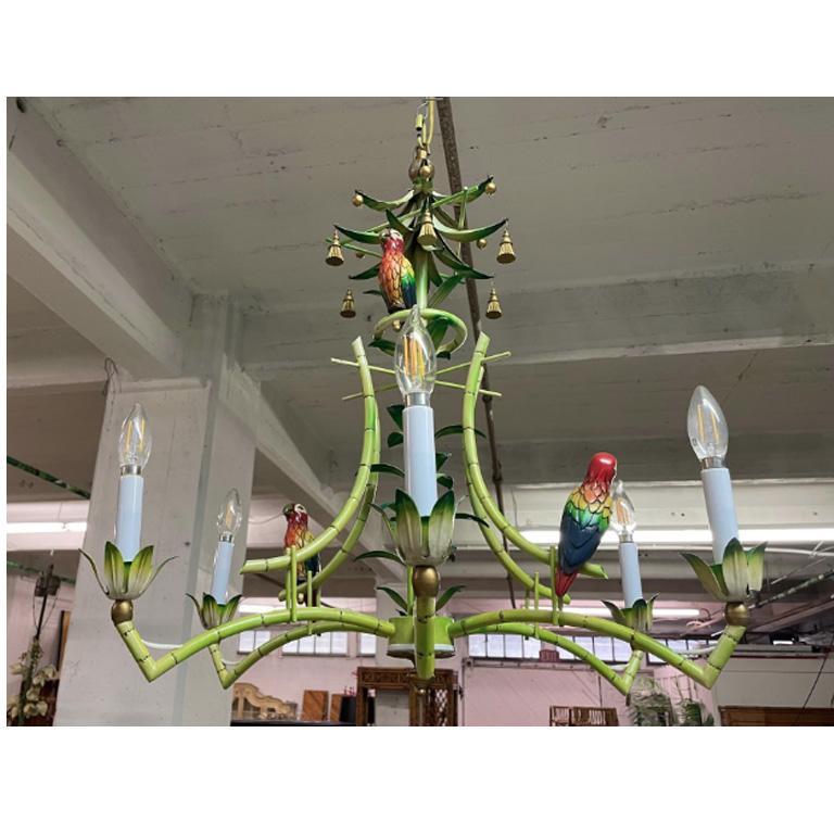 One of a kind hand painted tole chandelier features brightly colored frame with three parrot sculptures and gold tassels. Good condition with imperfections consistent with age. See photos for details. Wiring is good, works perfectly. 

