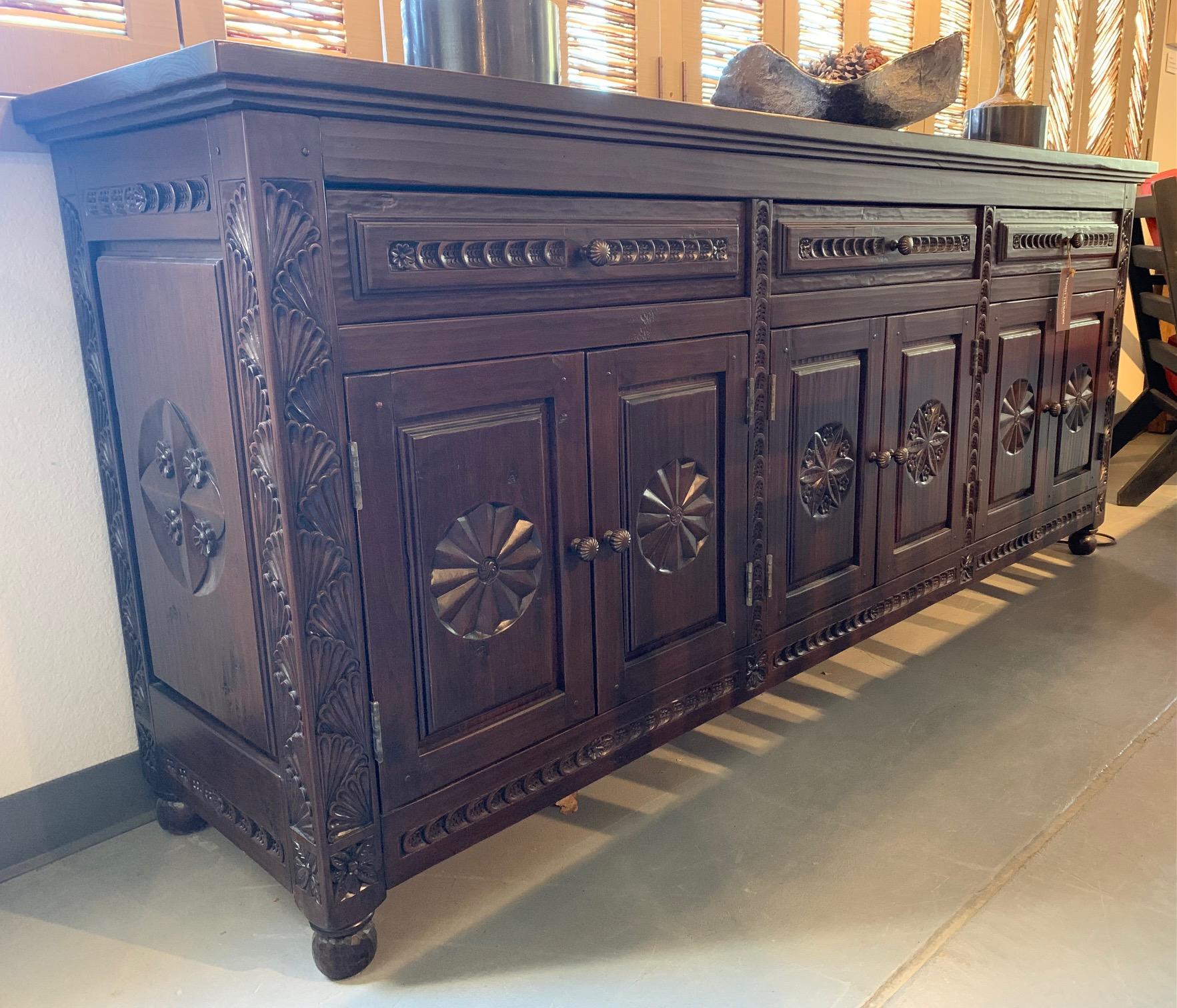 This is a made to order piece. Stunningly carved by craftsmen in New Mexico. The showroom model shown in photos is Knotty Alder with a Double Glaze Seville Finish. Showroom floor model not for sale...

Please inquire about finish options.
 