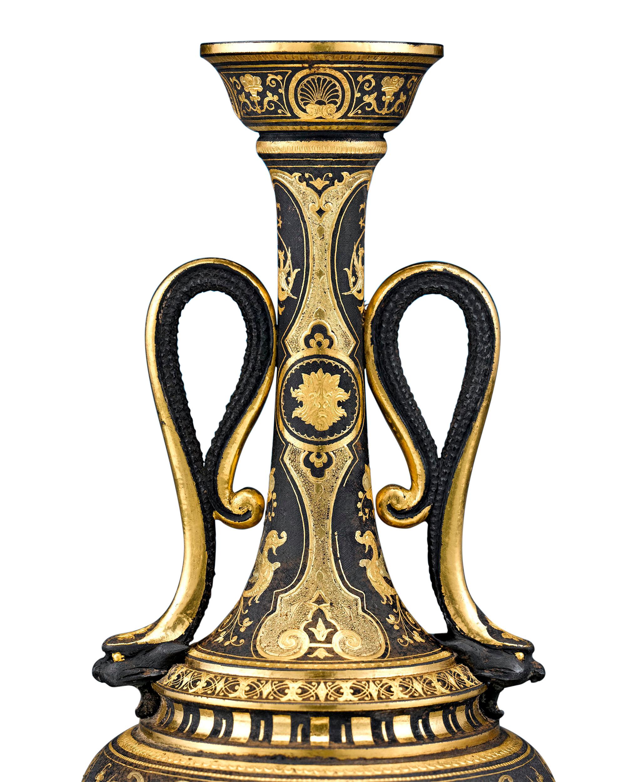 This superb damascene vase is exemplary of Toledo metalwork. The incredibly fine oxidized steel with gold inlay is congruent with the organic motifs used by craftsmen in the Zamboanga Peninsula of the Philippines. The Spanish first arrived in