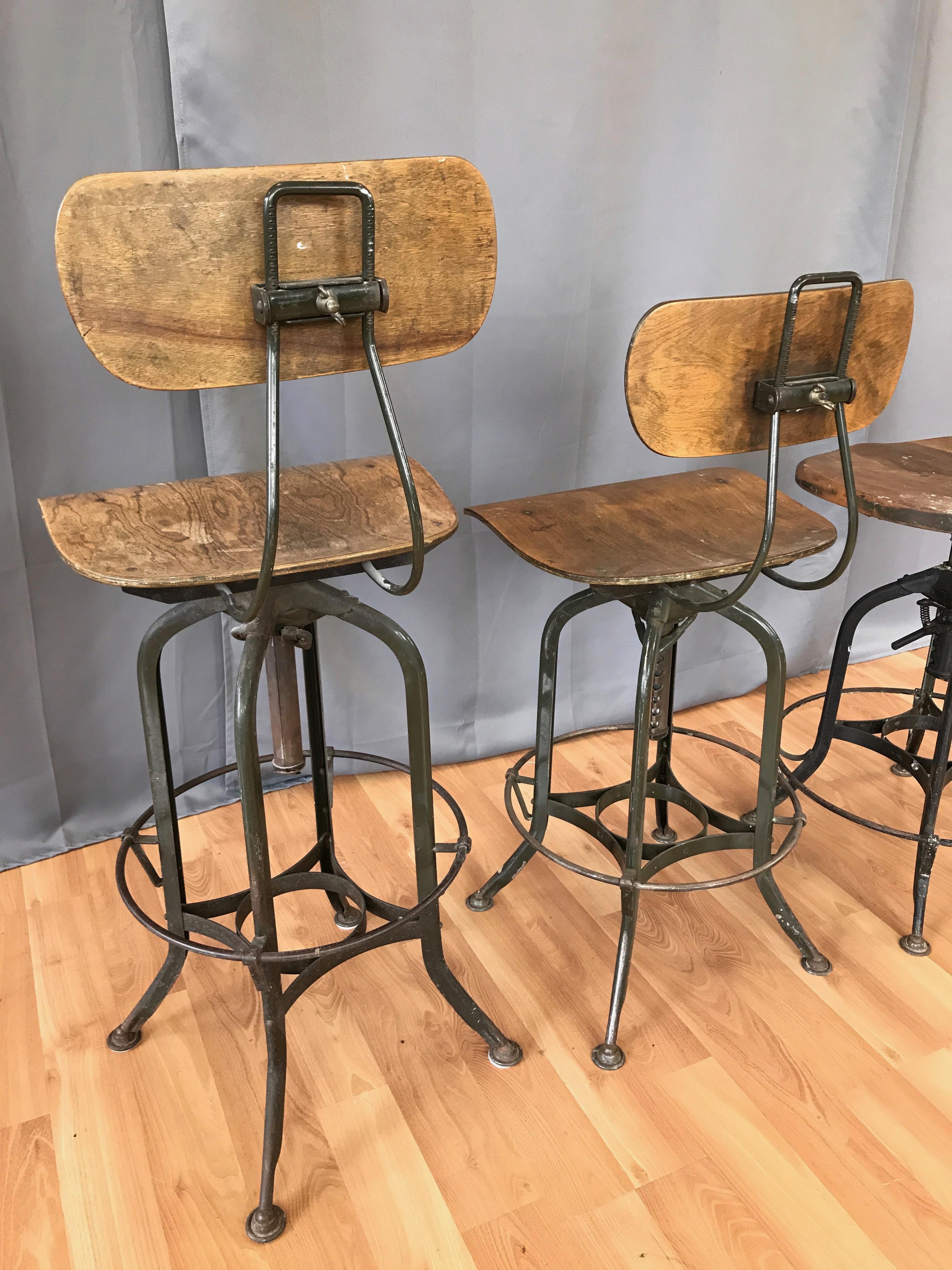 Toledo Industrial Adjustable Height Swivel Stools with Backs, Two Available 5