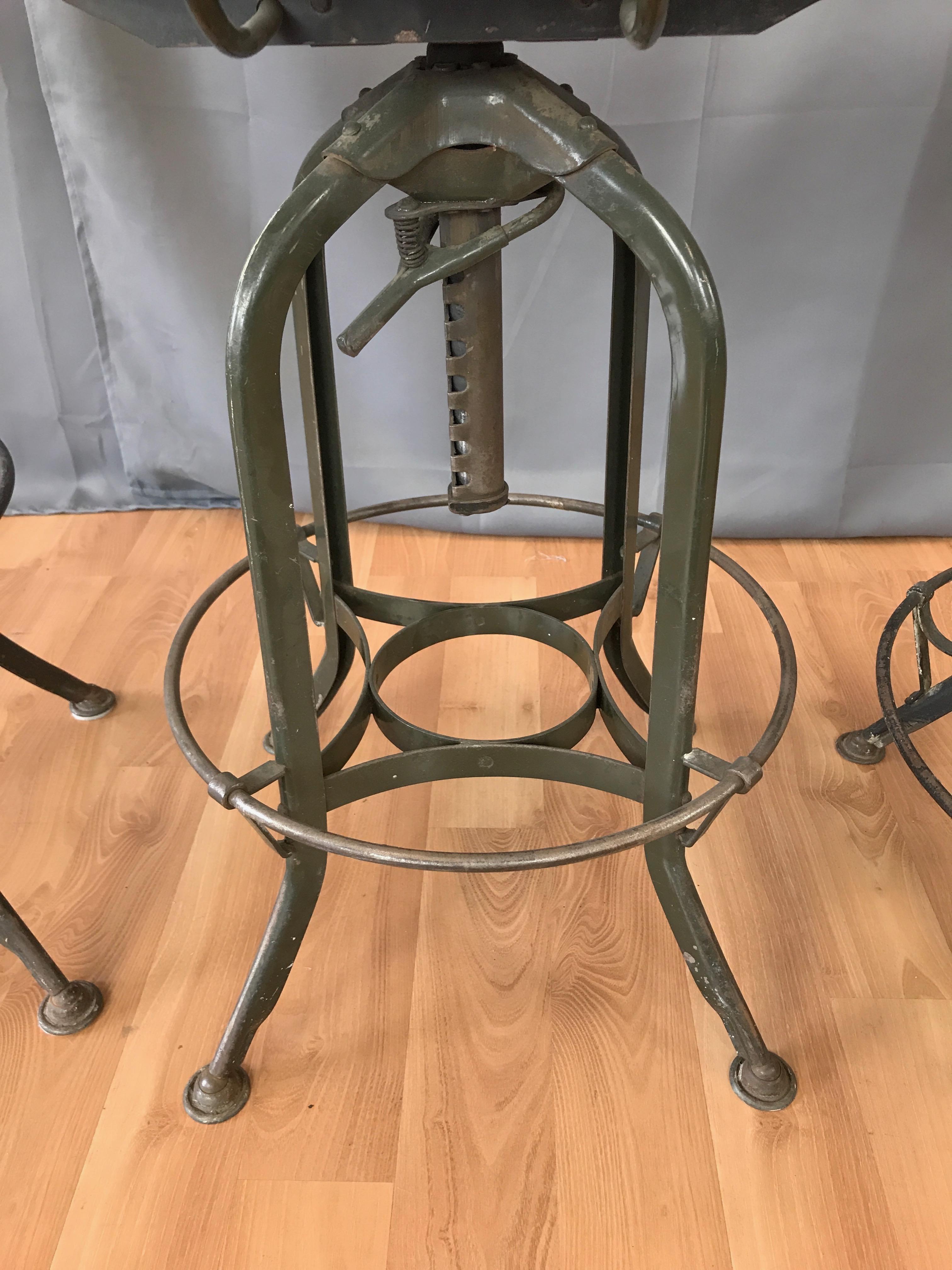 Toledo Industrial Adjustable Height Swivel Stools with Backs, Two Available 9