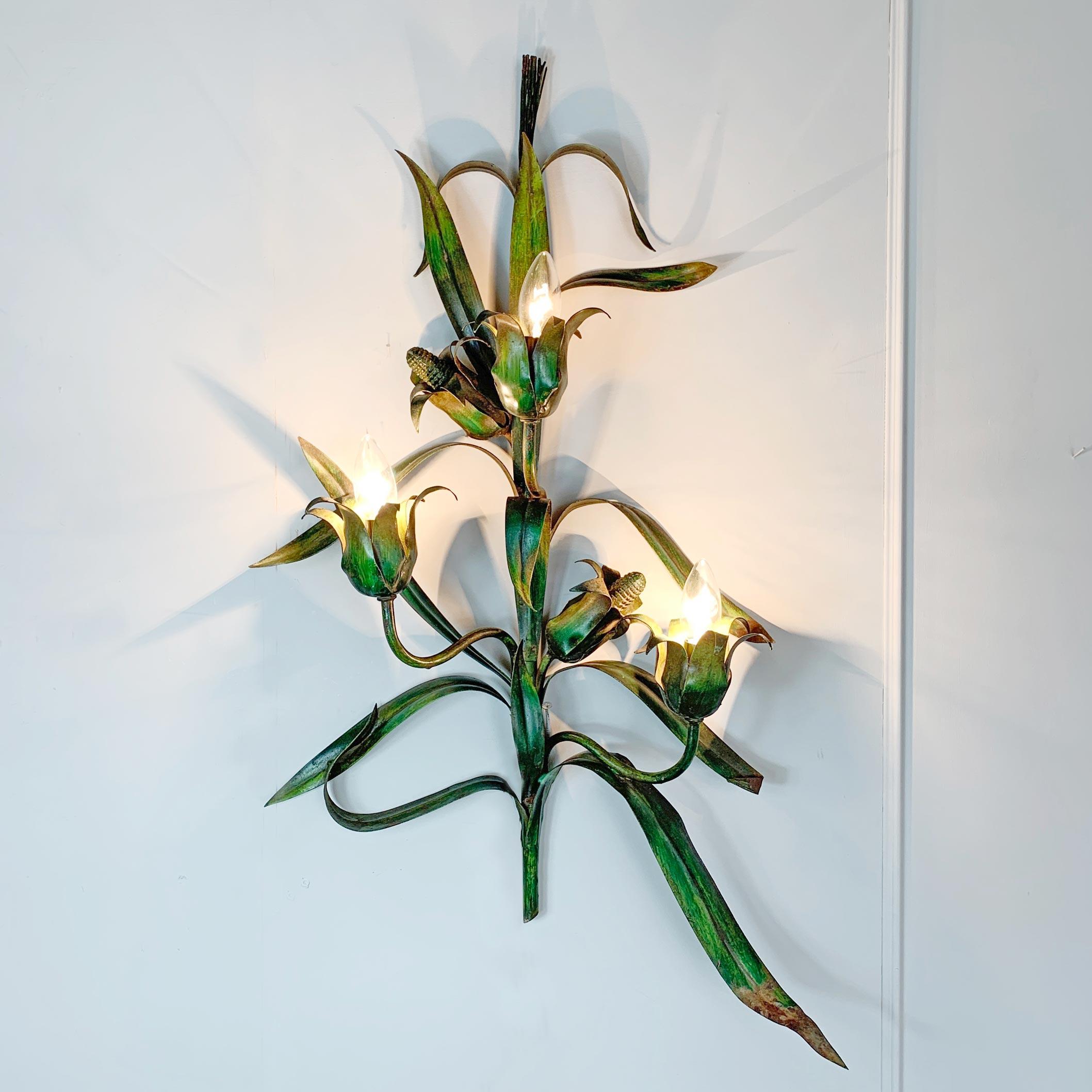 Maize/ corn toleware wall lightslarge maize/ corn toleware wall lights,
1960s, France

These rare and very large wall lights are in the design of maize stems with corn cobs and leaves, tipped with maize seed heads

Measures: 80cm height, 48cm