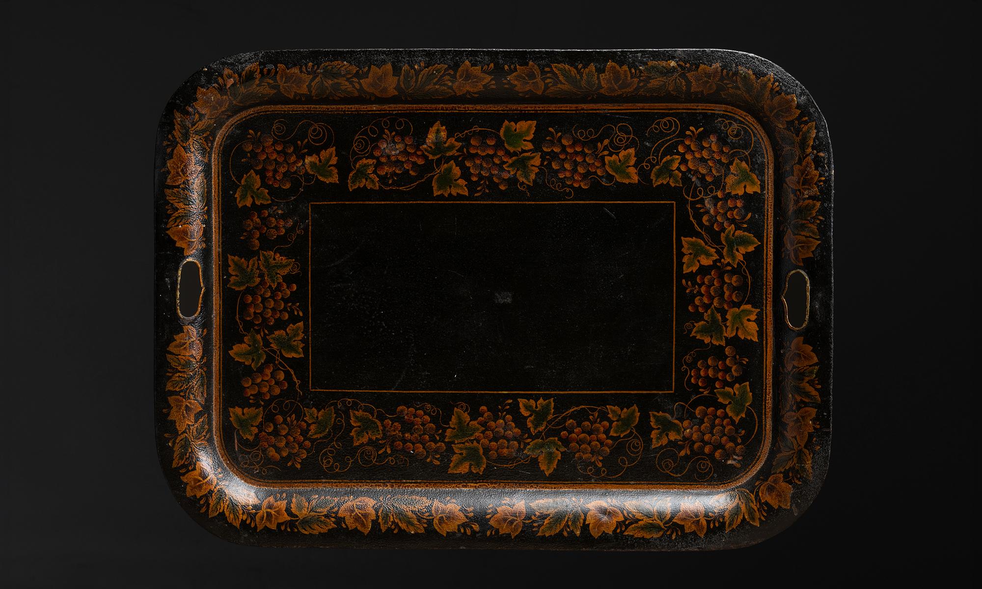 Toleware Tray

England circa 1890

Hand painted design of foliage and grapes, with distressed surface.

28.25”L x 21”d x 1”h