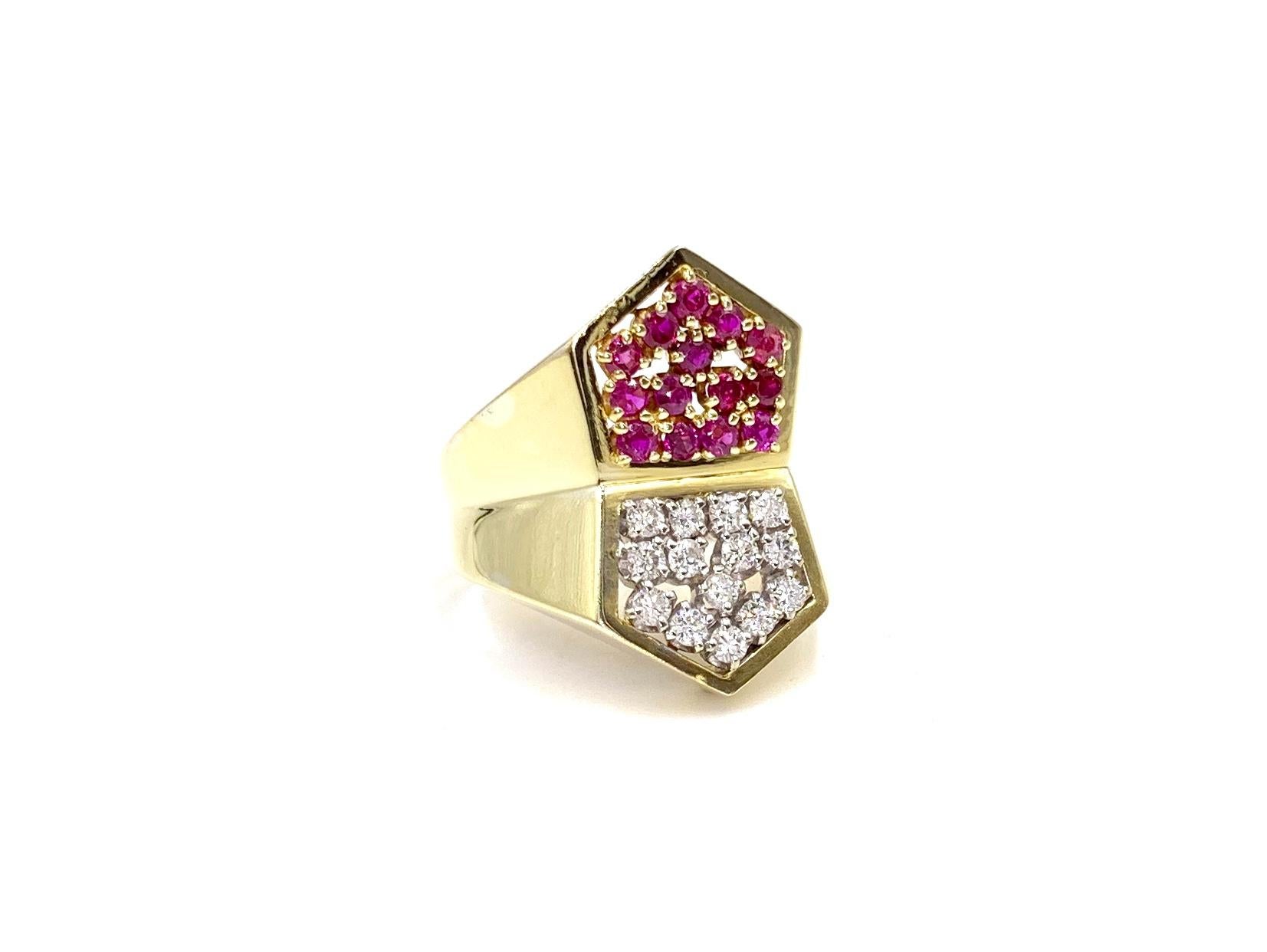 Created by Italian expert goldsmith designer, Toliro Jewelry Company. This polished 18 karat gold modern elongated geometric ring features 14 round brilliant diamonds and 14 well saturated round rubies. Approximate diamond weight is .49 carats total