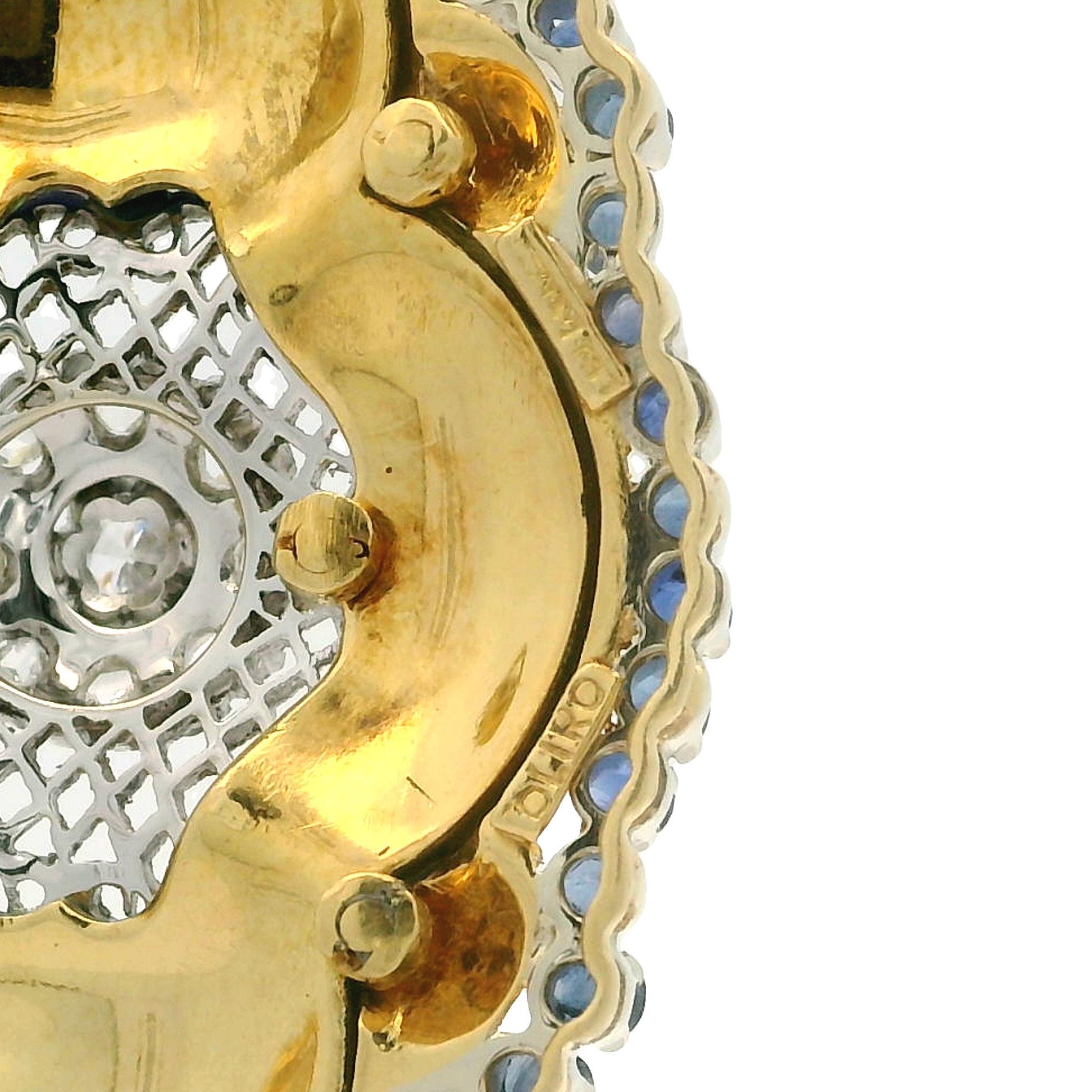 --Pierre(s) :...
(48) Saphirs véritables naturels - taille ronde - sertis - couleur bleue vibrante - 1,40ctw (approx.)
(13) Diamants naturels authentiques - taille rose et ronde brillante - sertis - couleur blanche - 0,12ct (diamant central