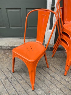 Tolix Orange Stacking Cafe Chairs