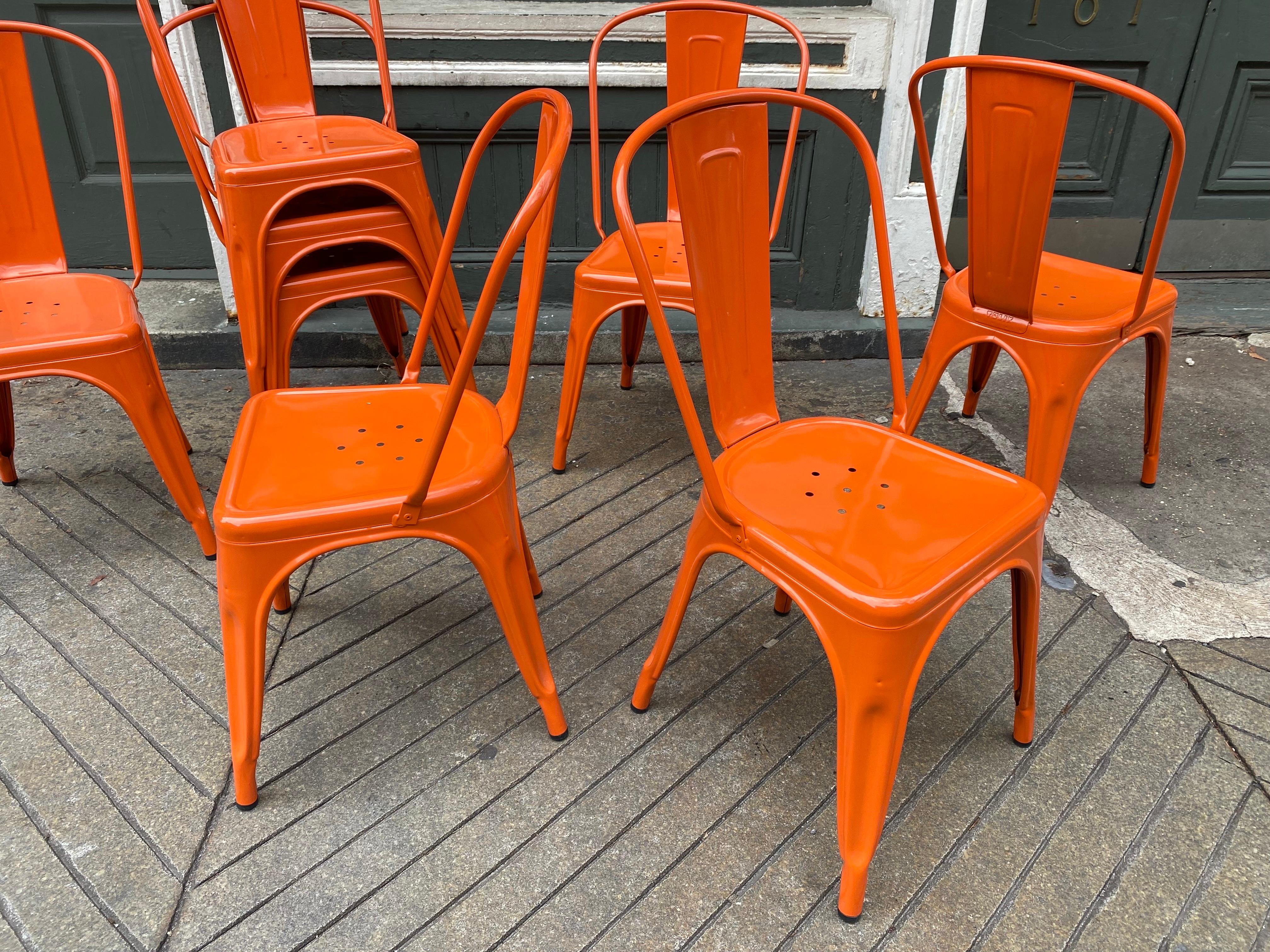 Contemporary Tolix Orange Stacking Cafe Chairs