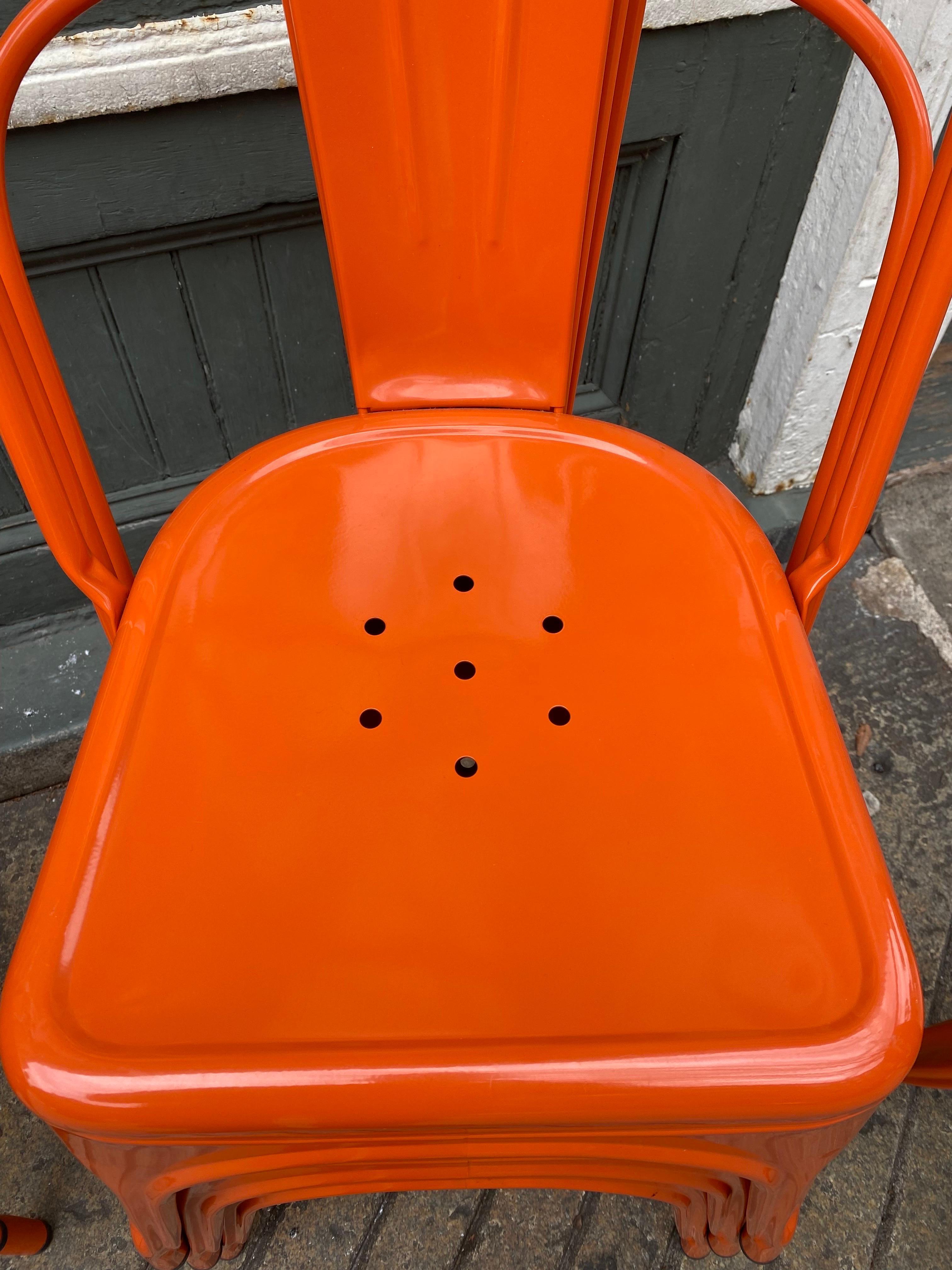 Tolix Orange Stacking Cafe Chairs 2