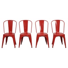 Tolix ensemble de (4) authentiques chaises empilables en acier rouge vintage fabriquées en France