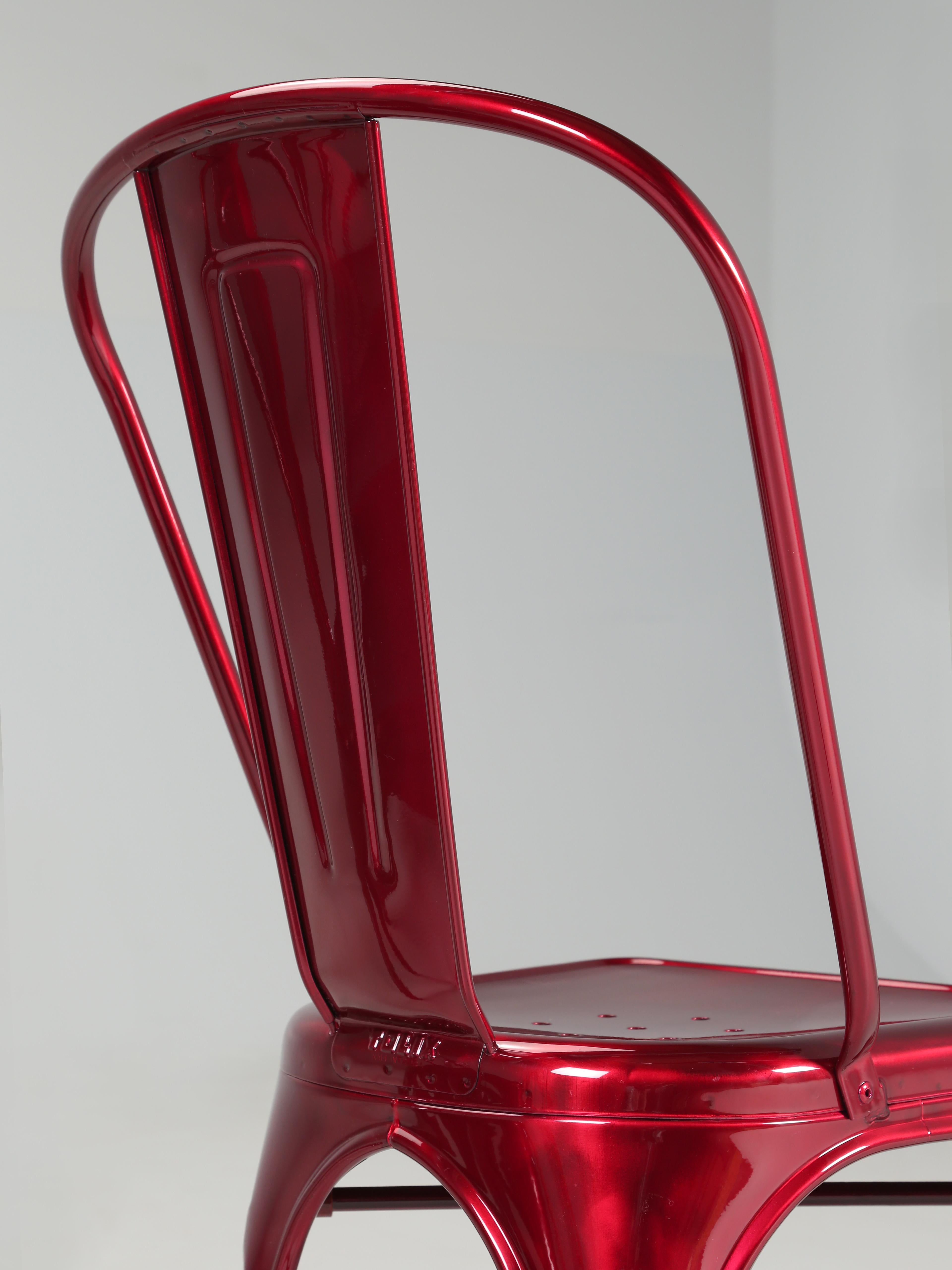 Contemporary Tolix Set of (4) Steel Stacking Chairs in a Brilliant Candy Apple Red Metallic