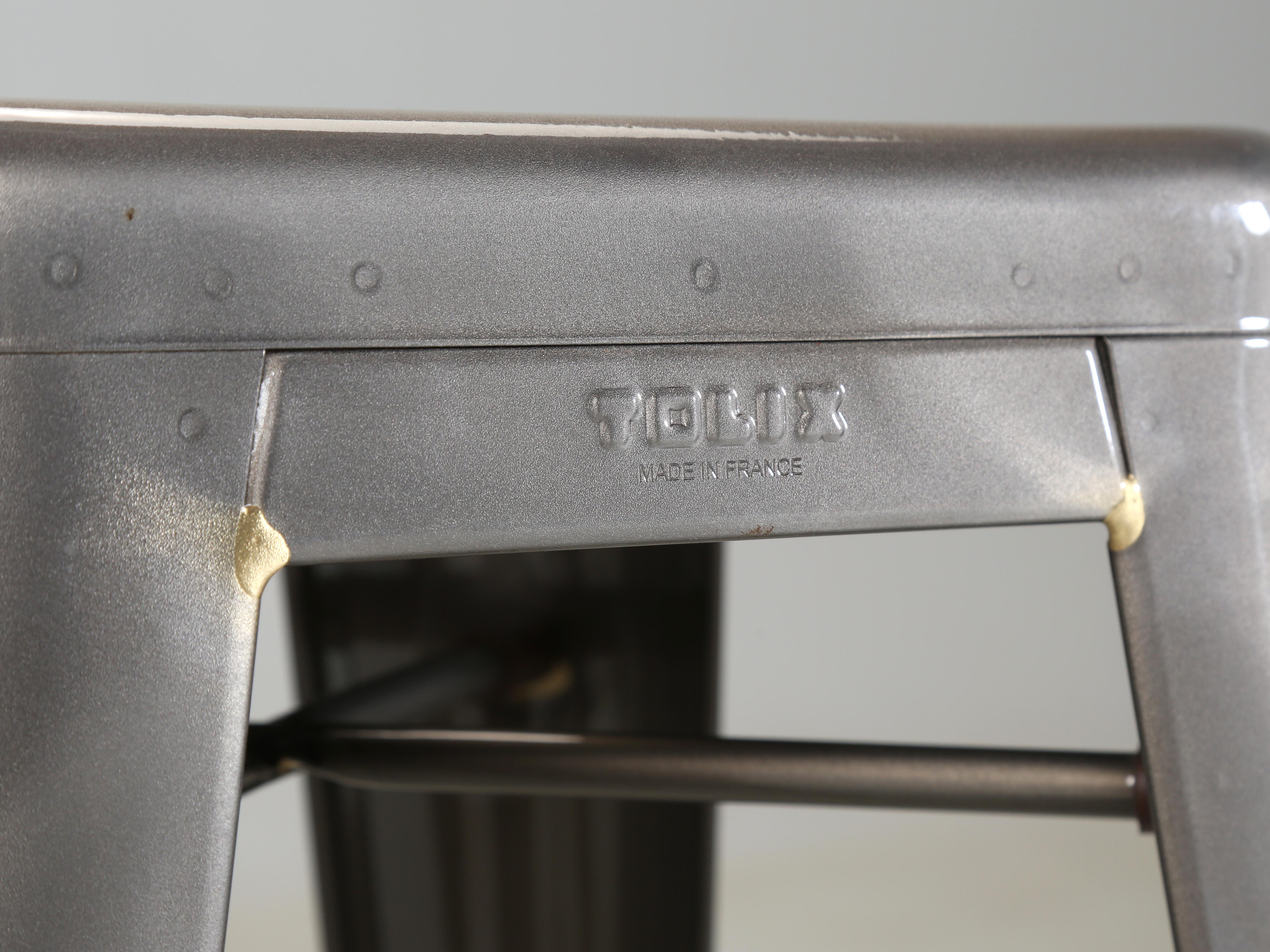 Steel Tolix Set of (6) Bar Height Stools Made in French Also Counter Height Available For Sale