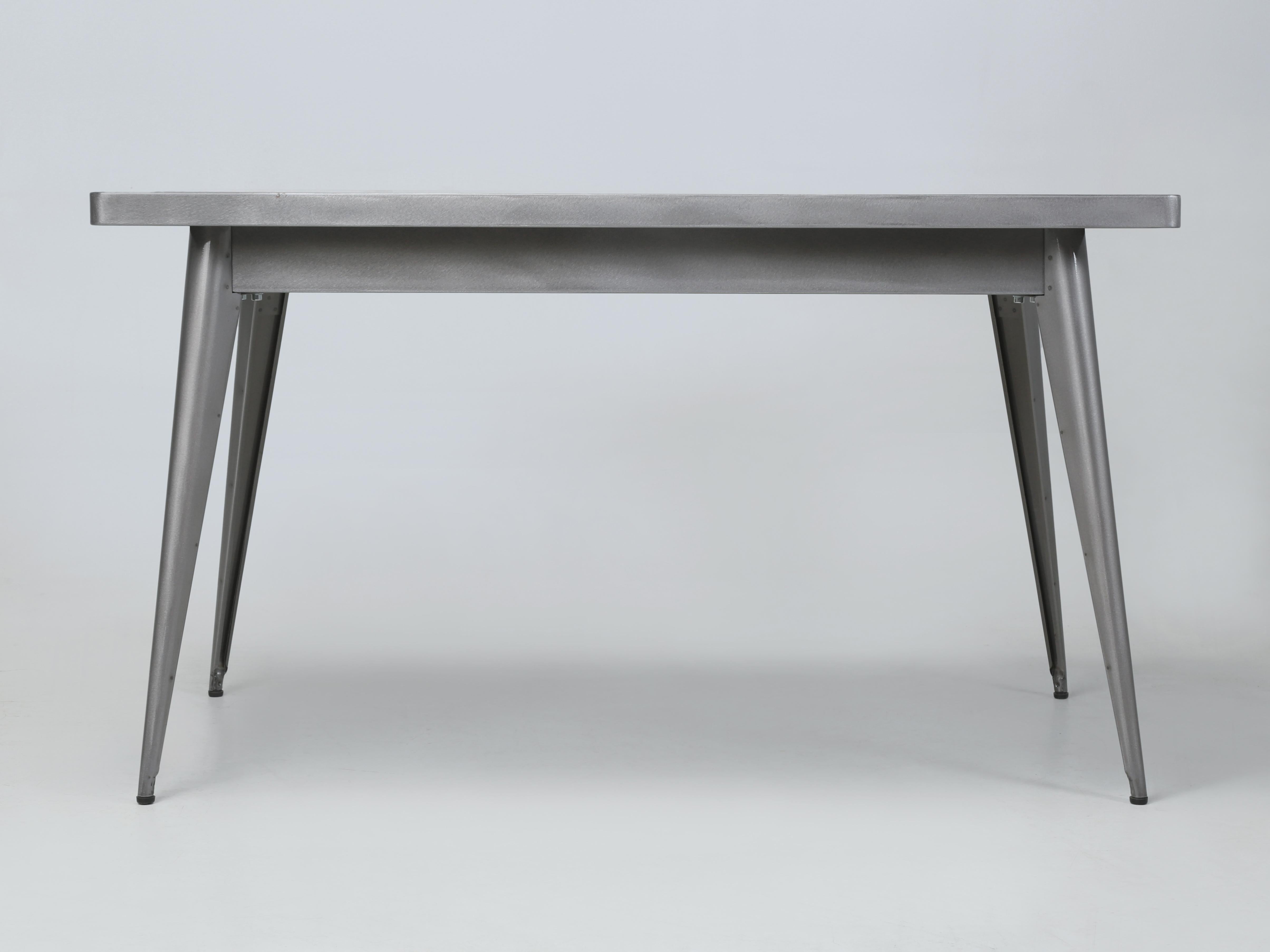 Tolix Steel Small Kitchen Table or Occasional Table with removable legs for convenience. This is a Genuine Steel Table from Tolix and was made in France and was sitting in a warehouse for over 10-years. We have a few Tolix Tables remaining along
