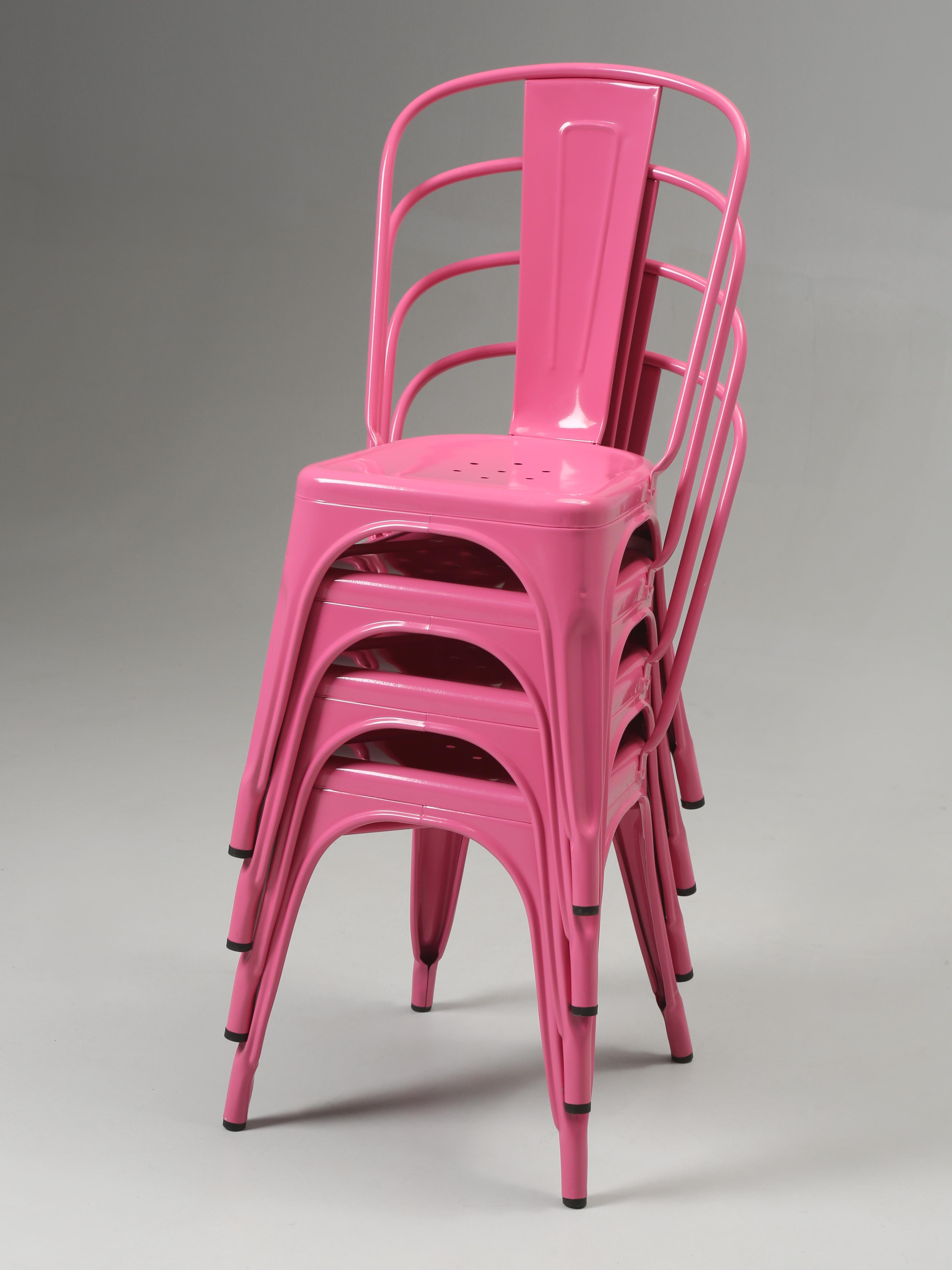 Authentic set of ( 4) Tolix chairs in Hot Bubble Gum Pink. The Hot Pink Powder-Coated finish  blends wonderfully in Tolix modern design, which was created in France in 1934 by metalworker Xavier Pauchard. The Tolix Chairs are lightweight and