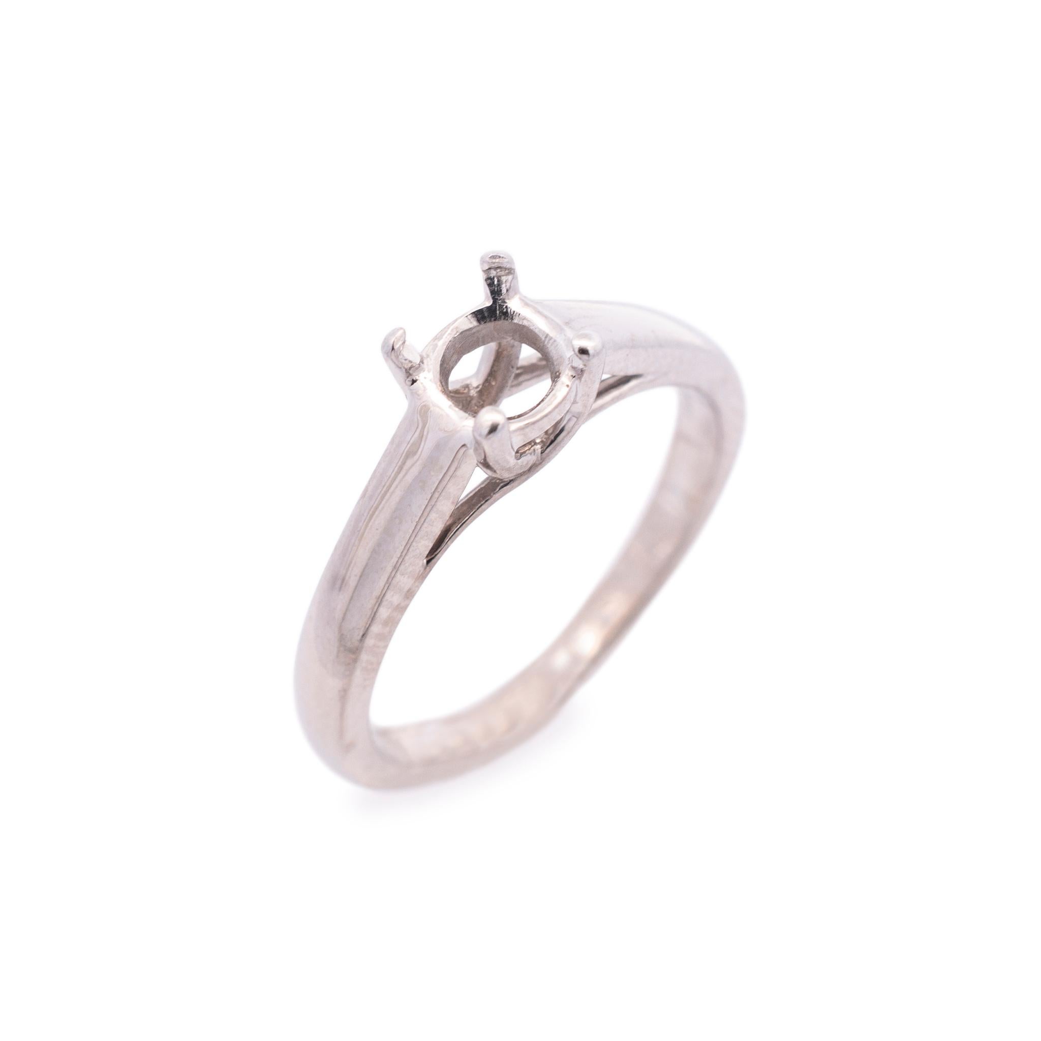Gender: Ladies

Metal Type: 14K White Gold

Size: 6.5

Shank Width: 2.10mm

Stone Measurements: 5.6mm to 5.8mm Diameter

Weight: 3.56 grams

Ladies 14K white gold engagement semi-mount ring with a half round shank.
Engraved with 