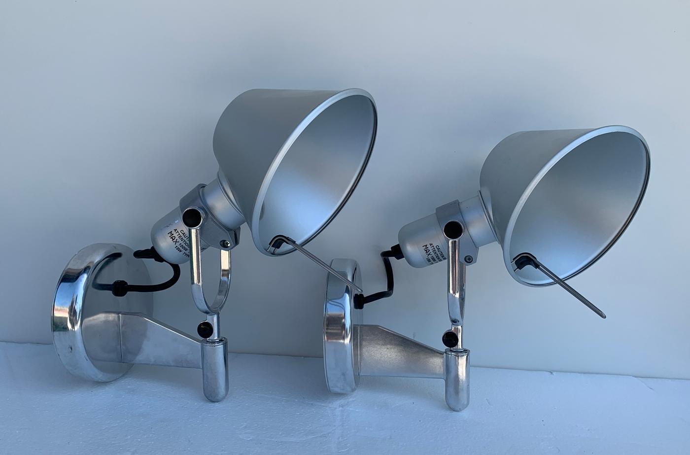 Pair of Tolomeo spot wall lights designed Michele De Lucchi Giancarlo Fassina and manufactured by Artemide.

An extension to the iconic Tolomeo family, Tolomeo wall spot combines the head of the Tolomeo table lamp with a wall support to allow for