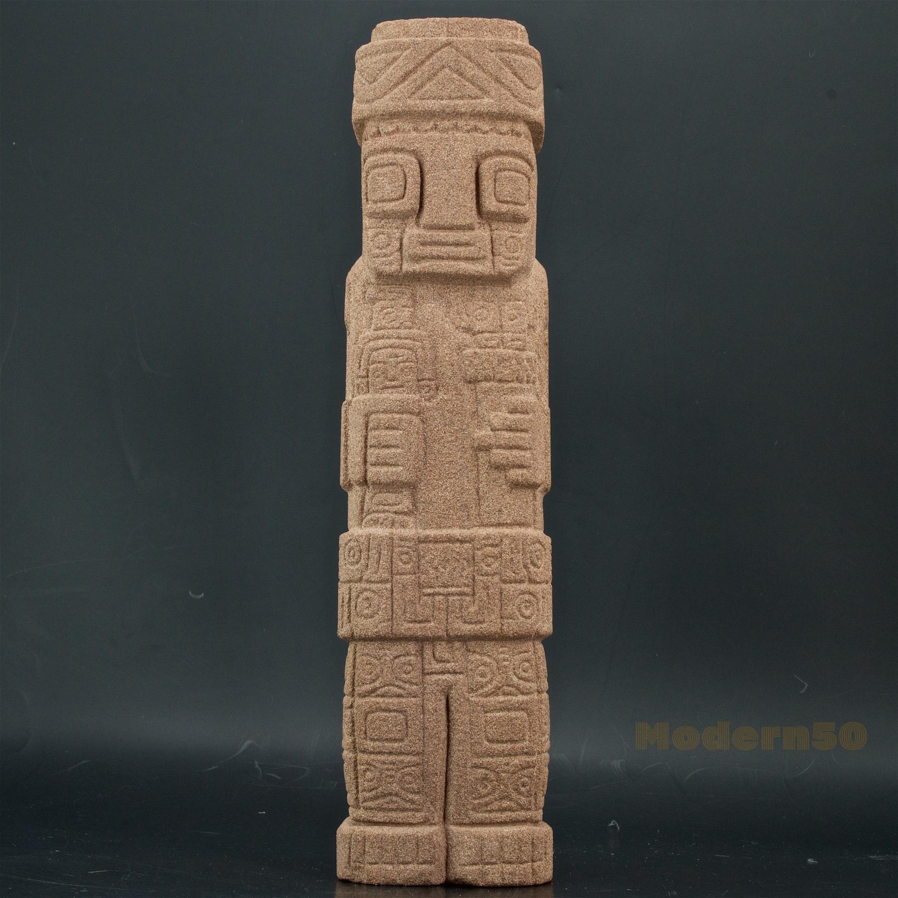 Cast with a sandy type material to mimic the volcanic stone of the original toltec antiquities. No markings or makers marks. 

   