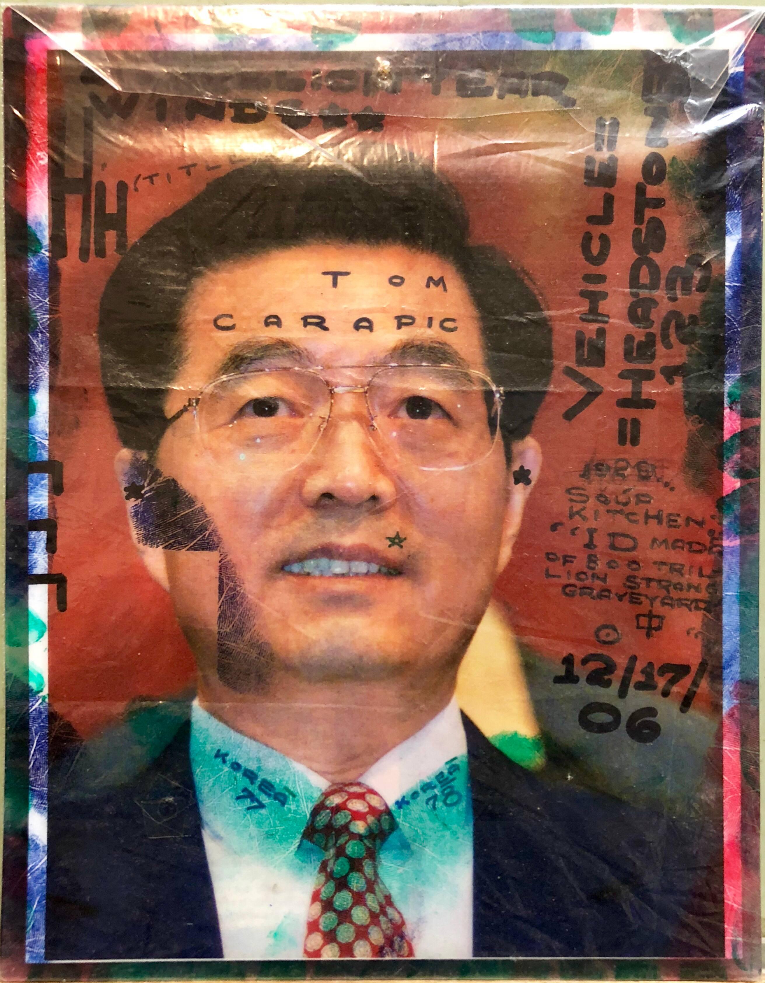 I think this one is the Chinese Premier on one side and fingerprints on the outside of the other side. wrapped in plastic. 
Tom Carapic (born 1939), full name Tomislav Sava Čarapić, is an artist who specialises in found object artwork. He also does